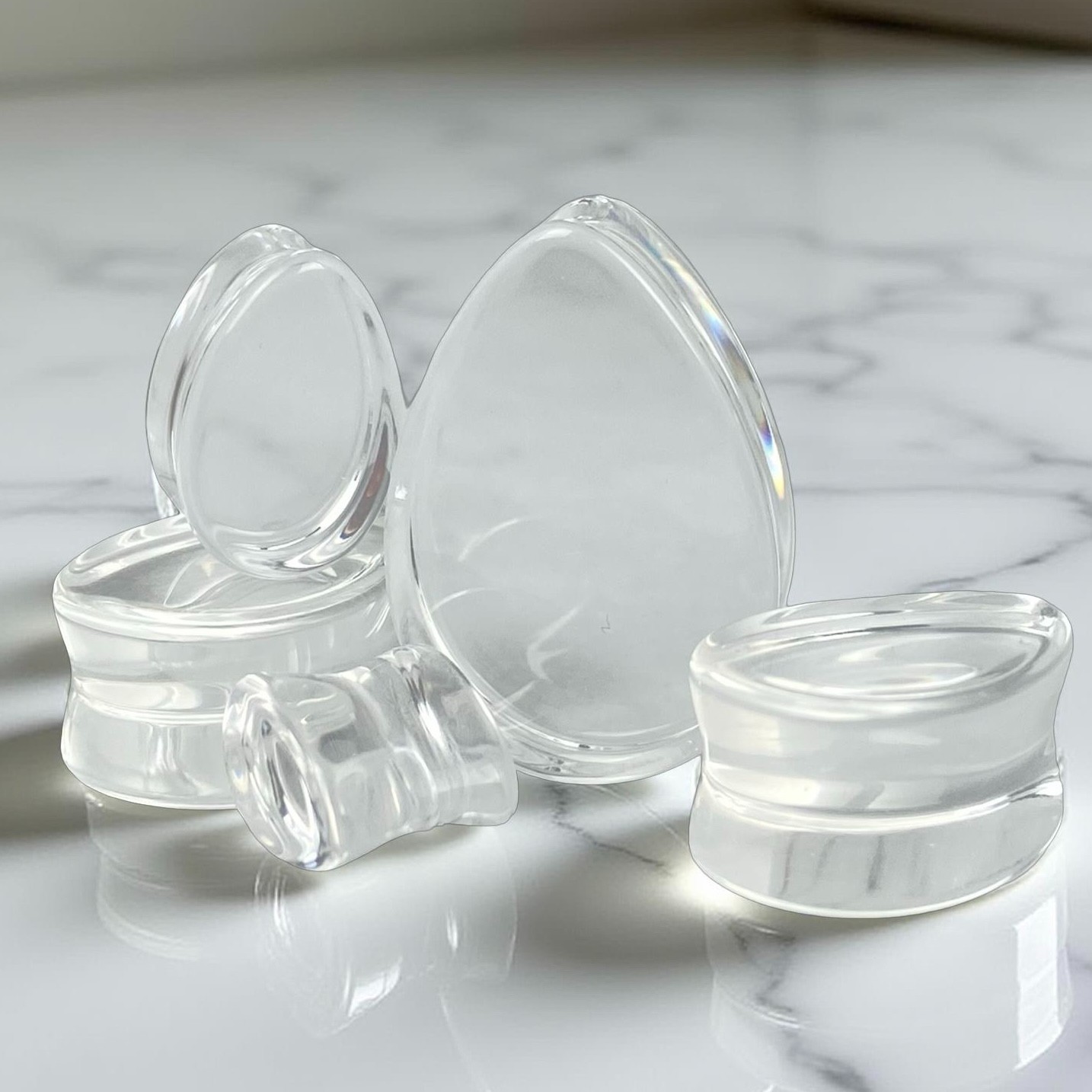 Pair of Clear Glass Double Flare Teardrop Glass Plugs (PG-545) gauges