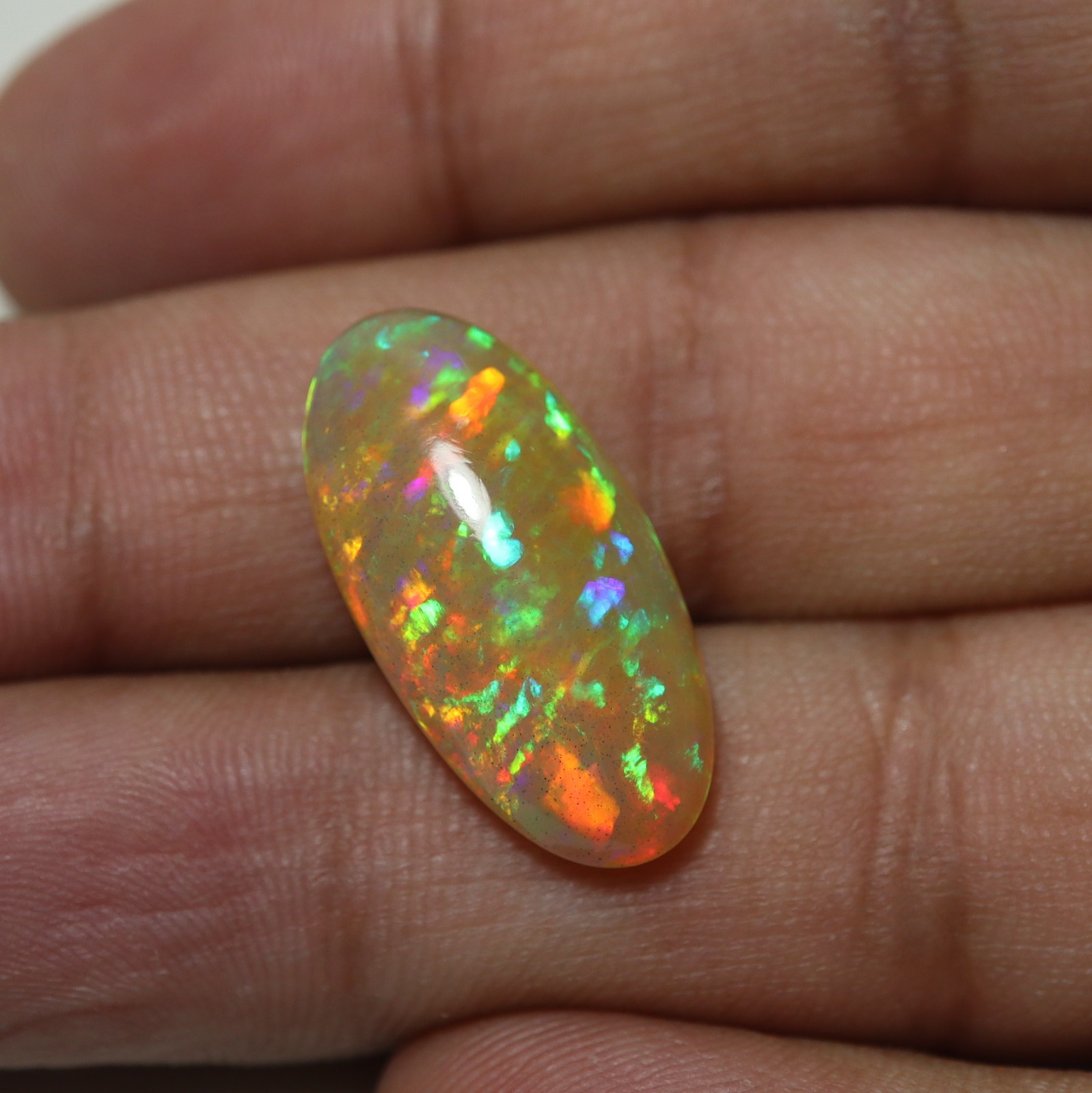 8.8Cts Natural AAA Ethiopian Opal Oval Flashy Rainbow Fire Cabochon 23.1×11.8 MM