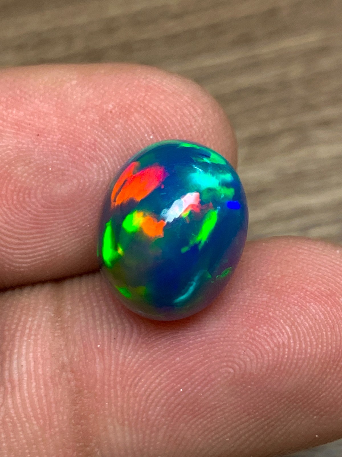 Ethiopian Opal Gemstone 6.35crt Black Oval Cabochon Rainbow Flash Welo Loose Gem