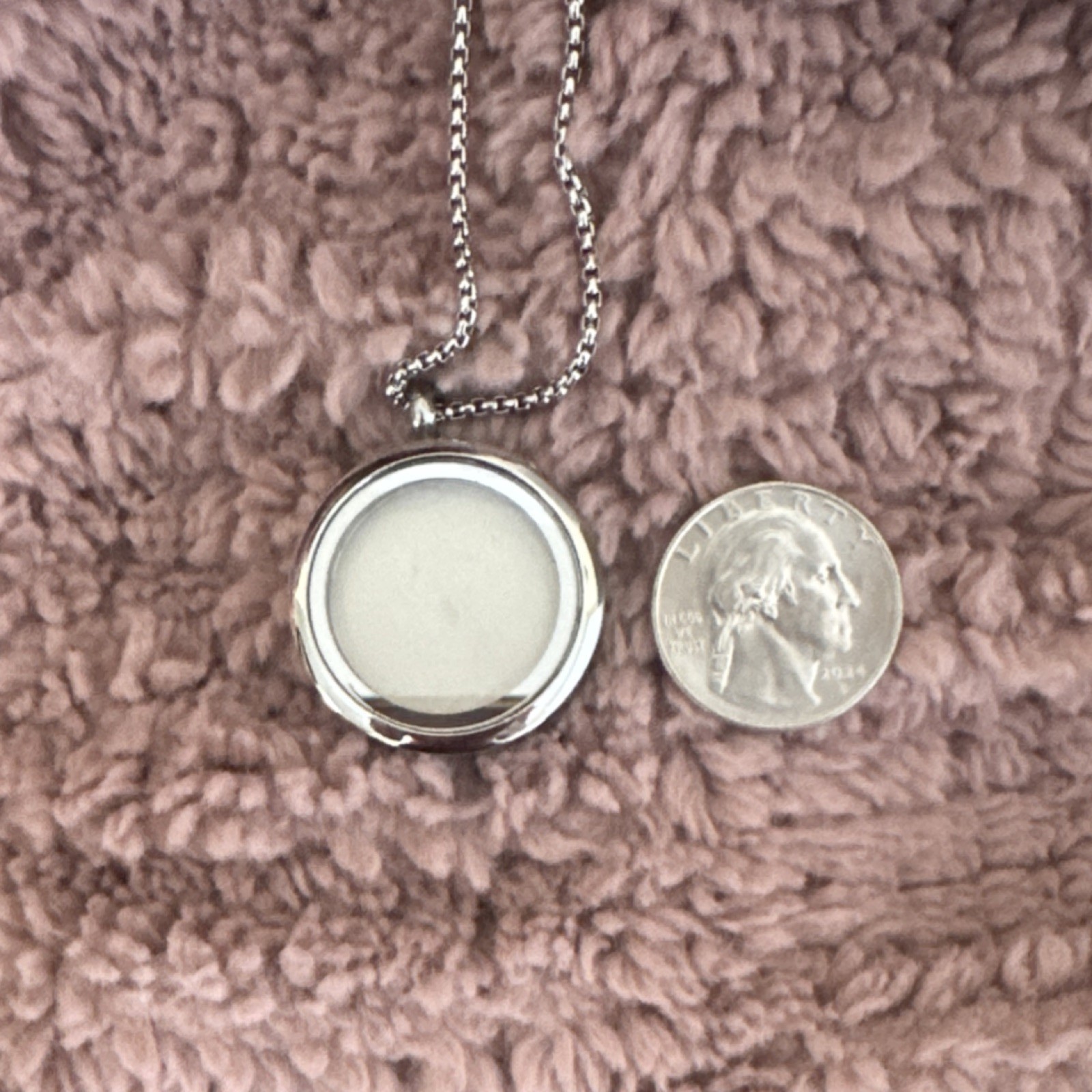 Silver or gold Round Locket Necklace holds a picture and cremation ashes.