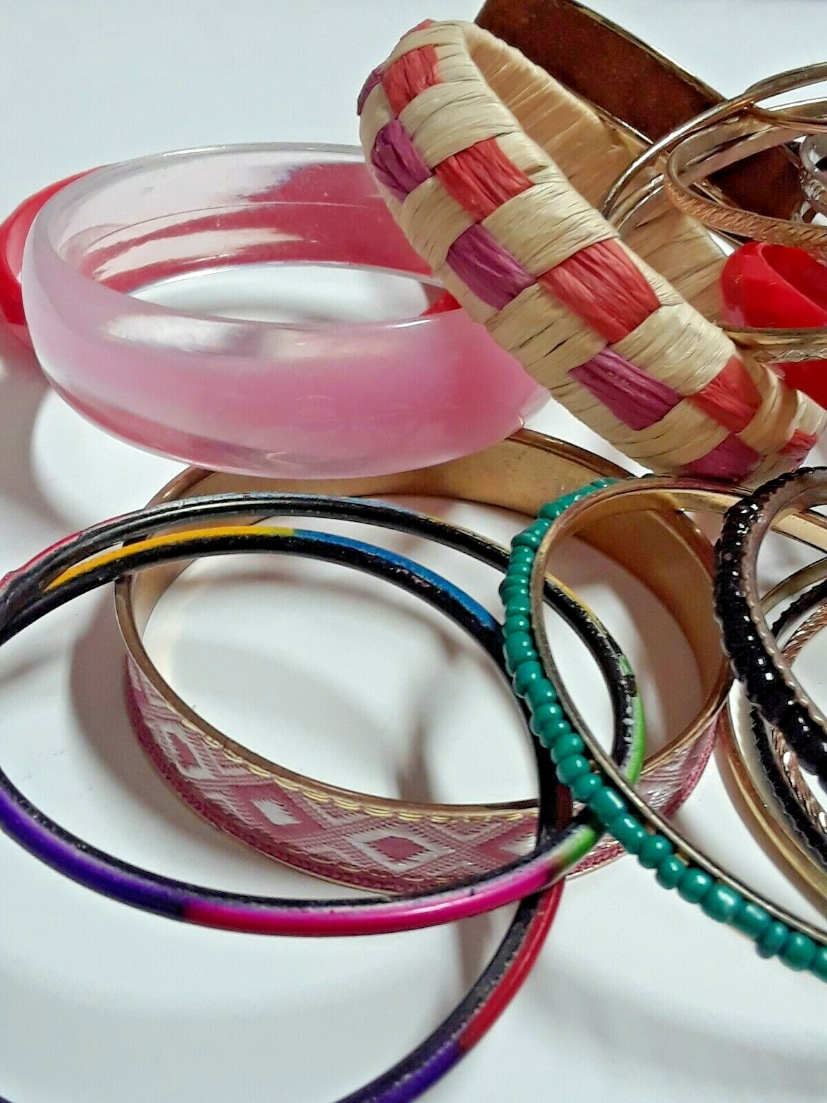 Bangle bracelets. gold tone silver tone, metal, plastic, with patterns. Lot
