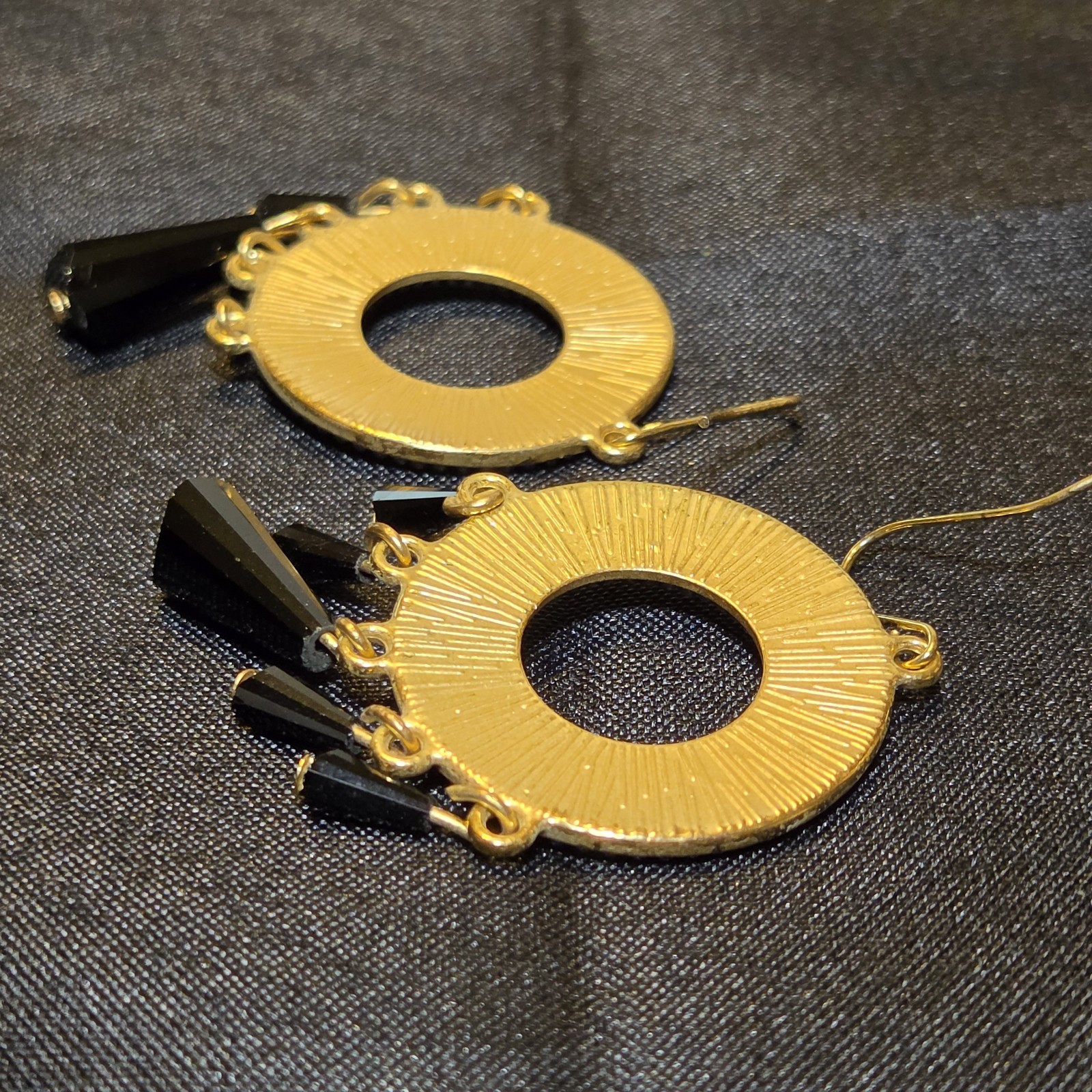 Elegand Golden Hoop Earrings With Black Dangles And Sparkling Crystal Accents