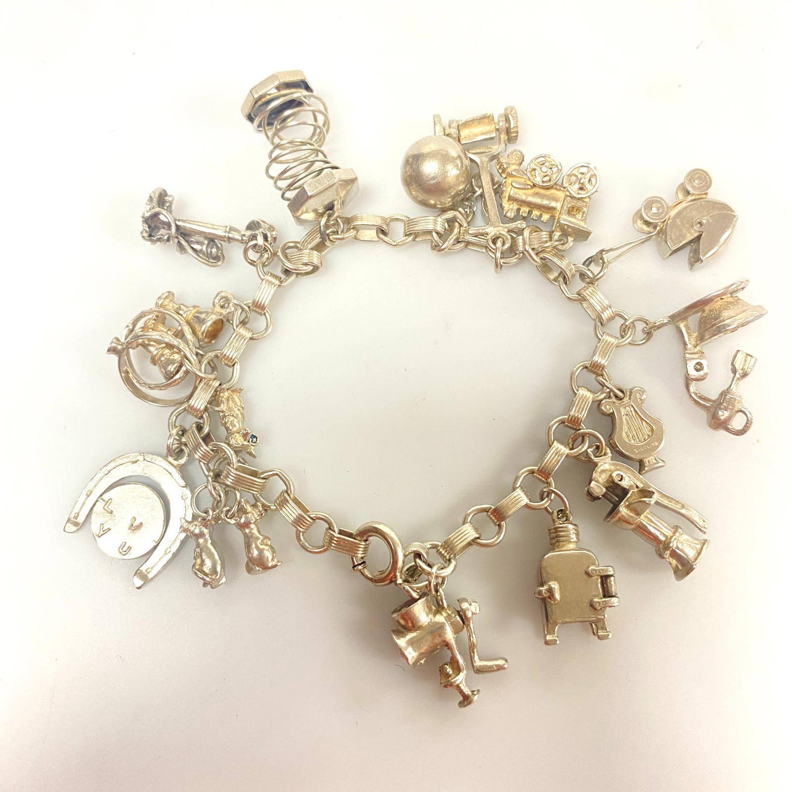 j848 Vintage Sterling Silver Chain Bracelet with multiple Various Charm Pendants