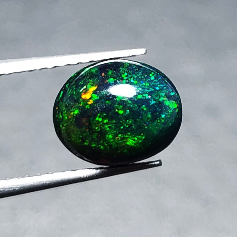 Ethiopian Welo Black Opal AAA+ Oval Cabochon Strong Green Play Loose 1.20Ct Gem