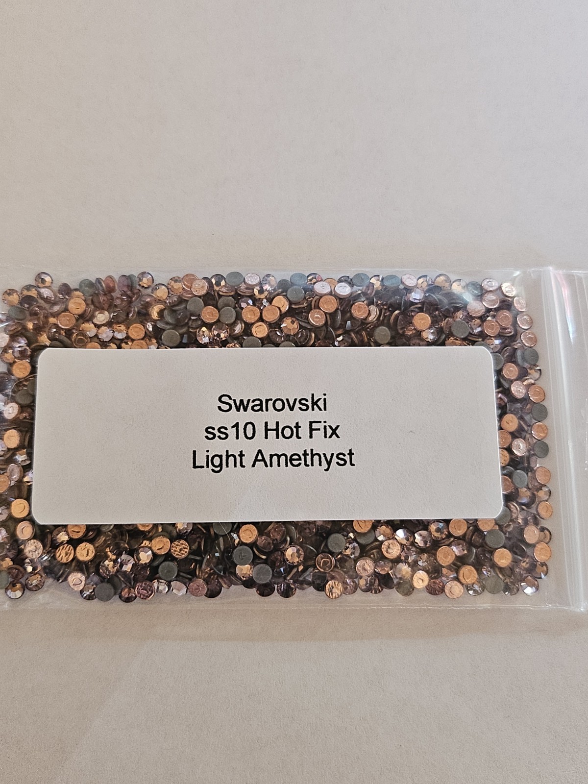 Genuine Swarovski ss10 Hot Fix Crystals in the color LIGHT COLORADO TOPAZ