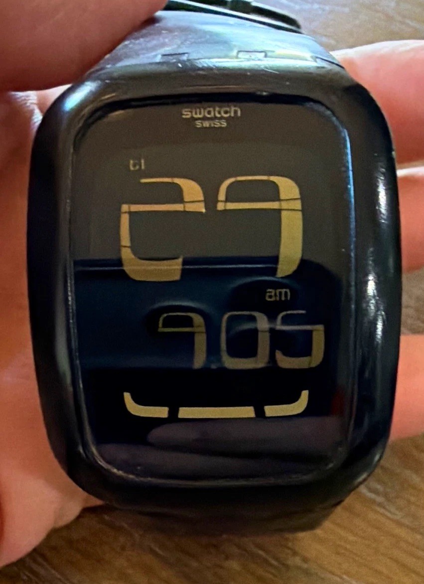 Swatch Touch Quartz Digital LCD Watch Black Dial Plastic Case Rubber Strap 30m