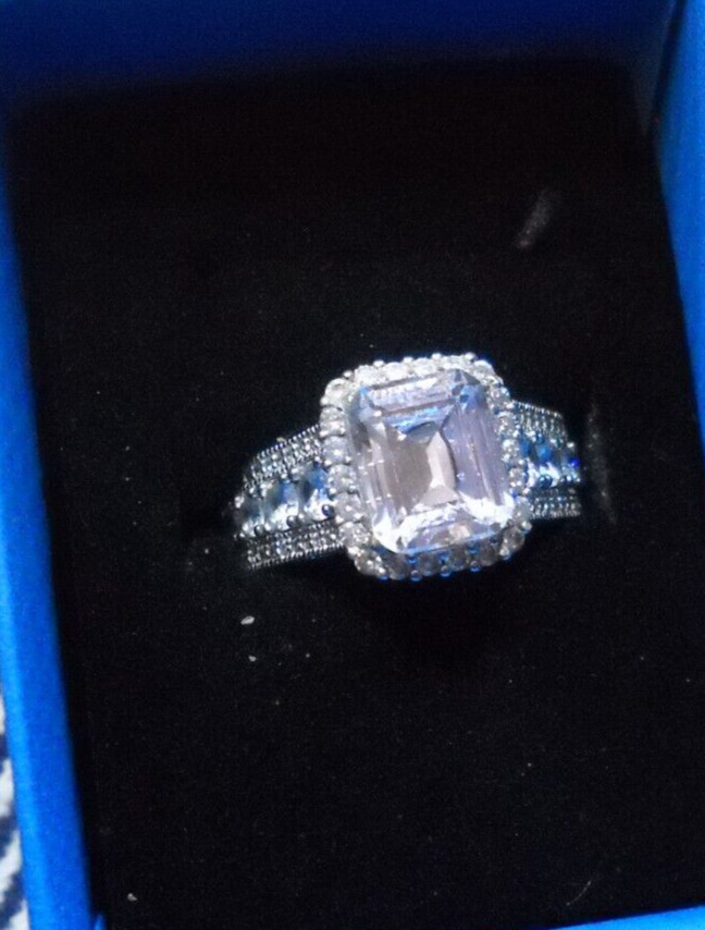 BELLA LUCE 7.83 CTW White Diamond Simulant RHODIUM OVER STERLING SILVER Ring