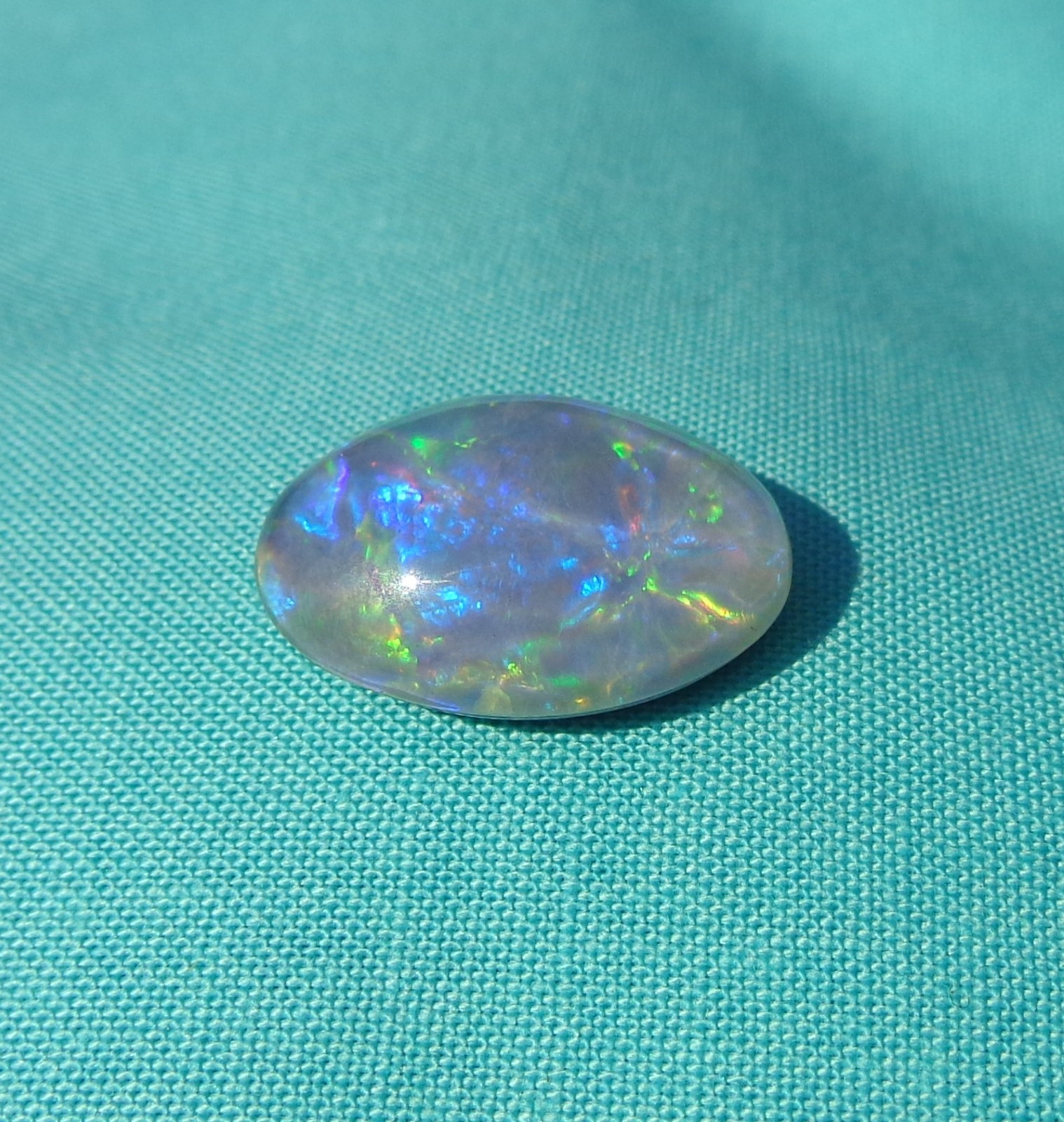Spencer Idaho Opal Triplet 15X20mm with a Blazing Green Fire in a Galaxy Pattern