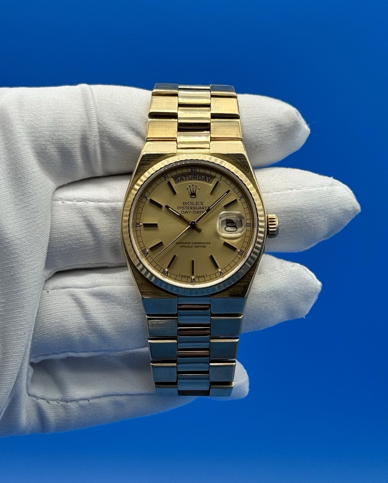 Rolex 19018 President Day Date Oysterquartz 18K Gold 36mm Champagne Dial Watch