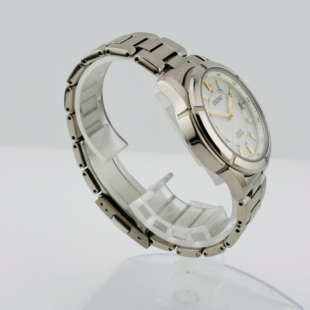 SEIKO Men’s Watch, Date Display, Original Strap, Solar Powered, Titanium