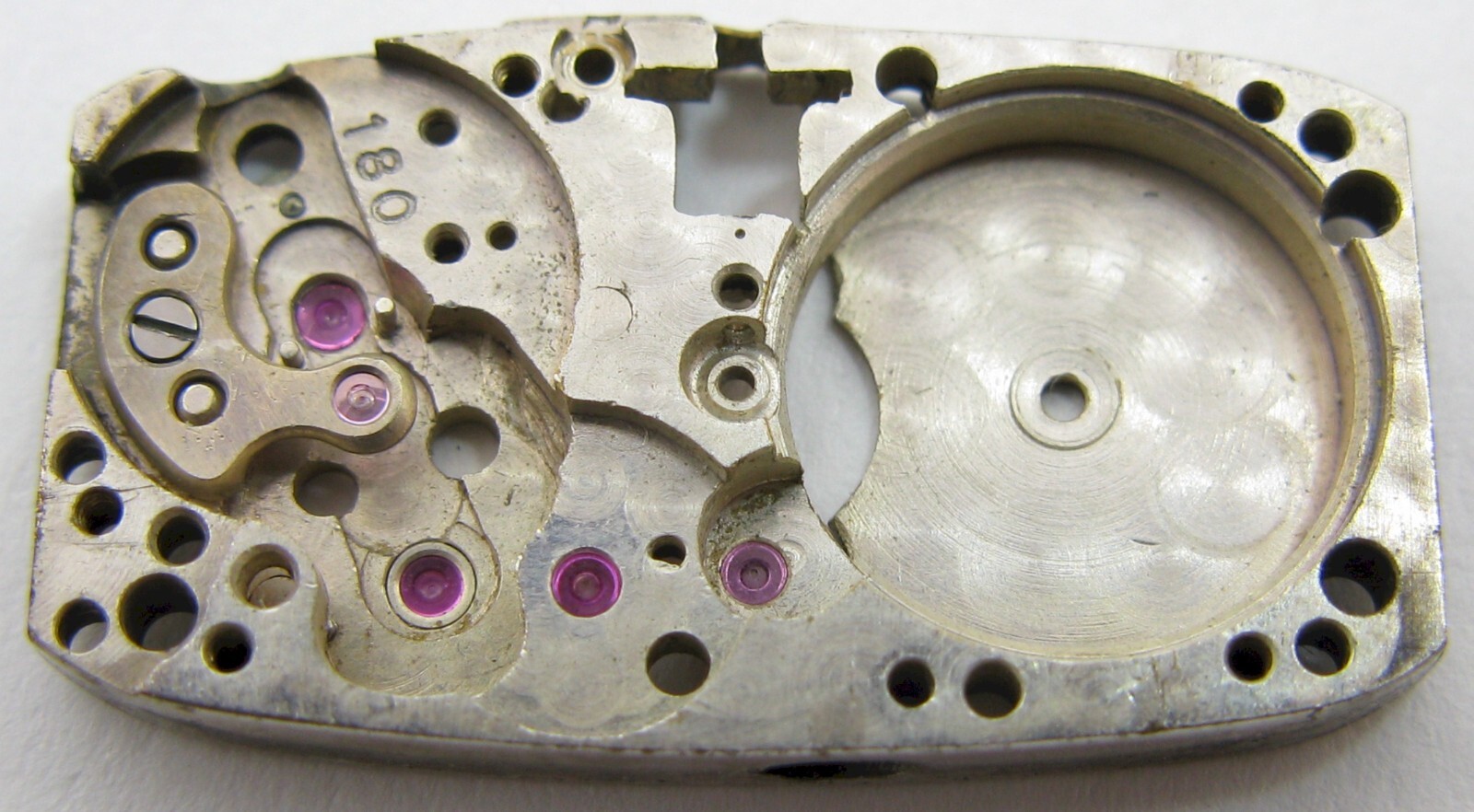 Rolex 180, F Watch Movement Part: main plate #100