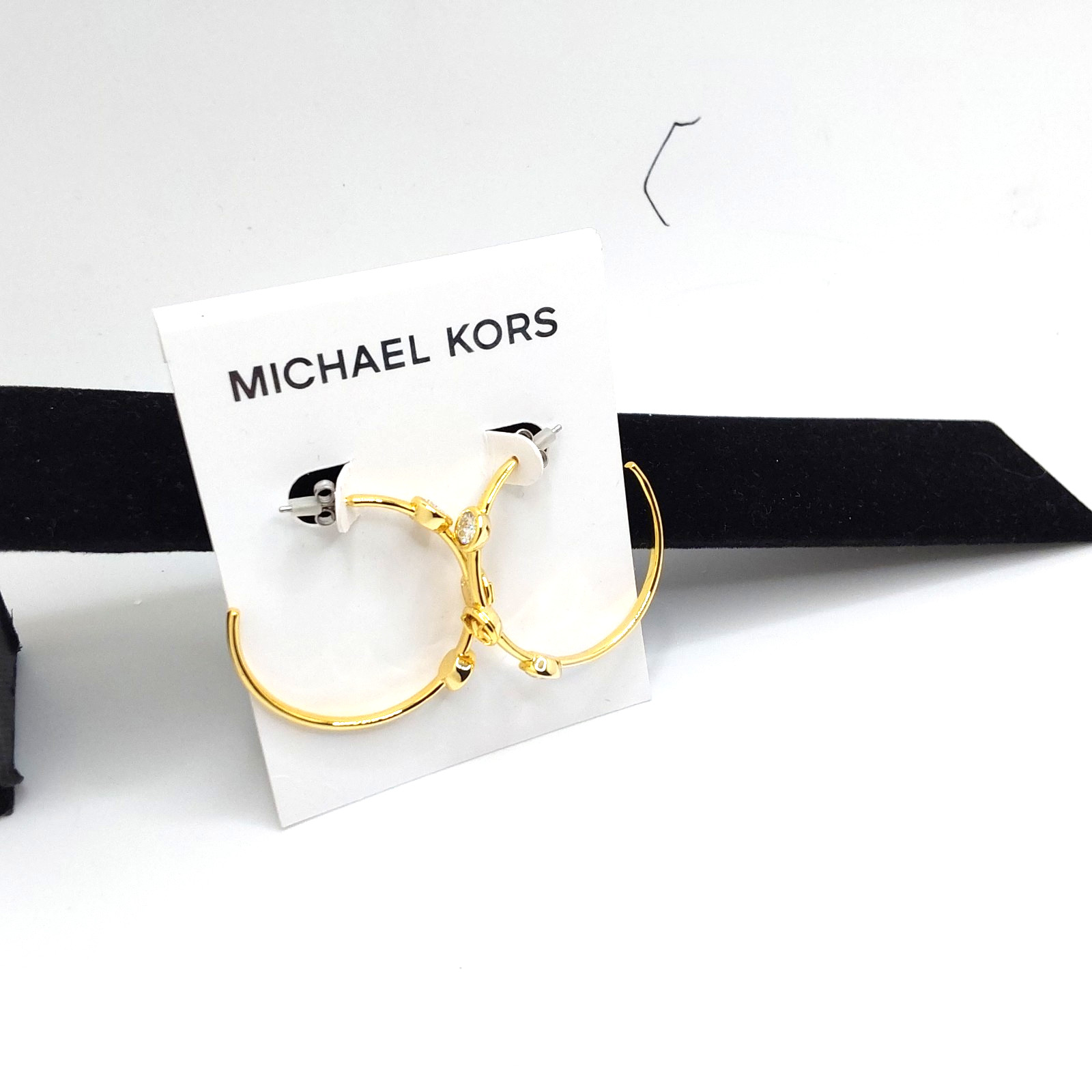 Michael Kors Evelyn Gold Tone Medium Open Hoop Earrings
