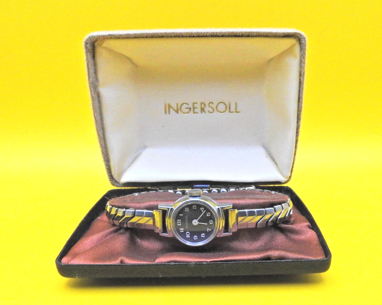 Vintage Ingersoll Ladies manual watch black face sprung strap Working order