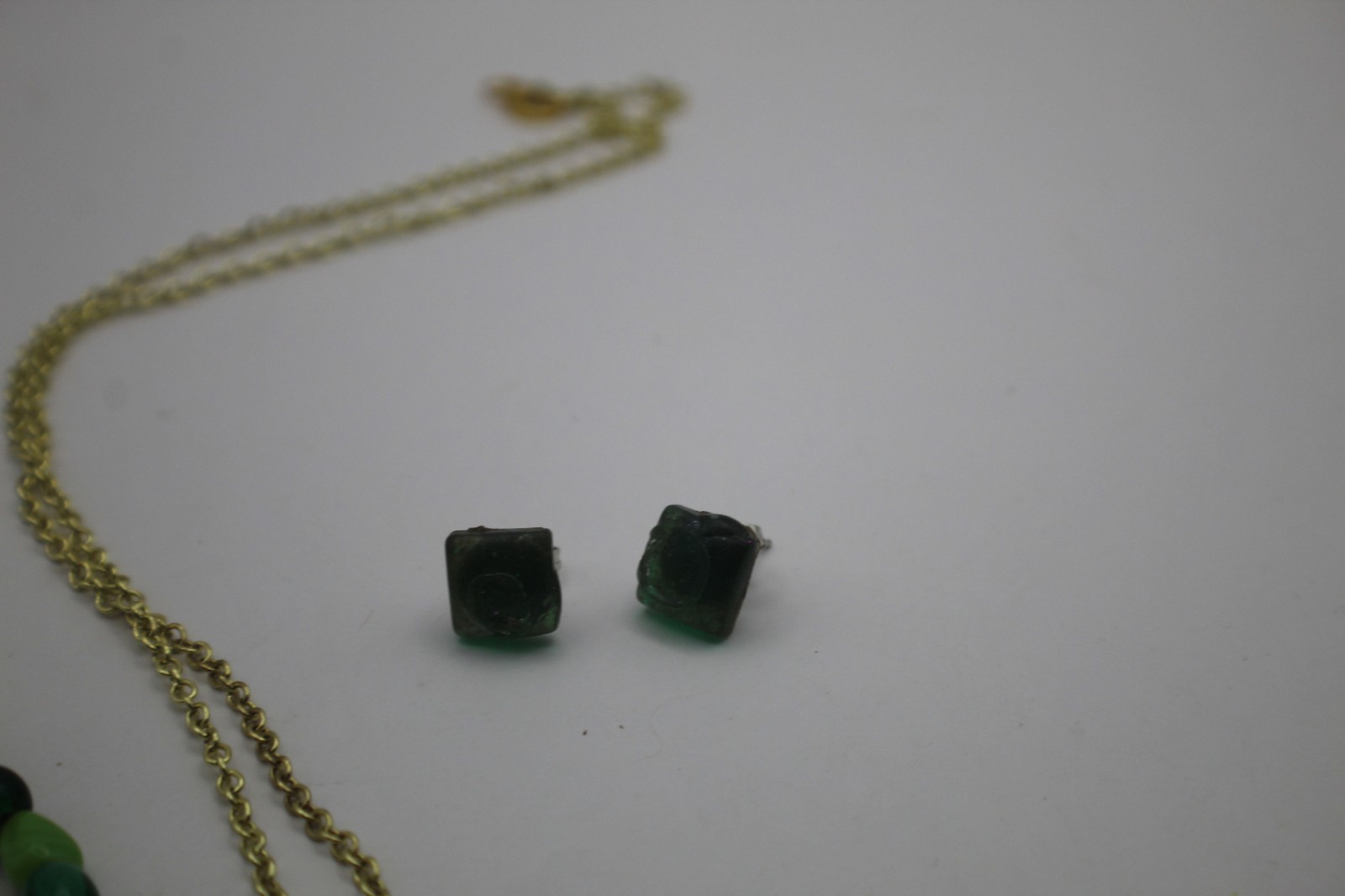 Green Three Piece Resin Jewelry Set Including Necklace Studs And Bracelet