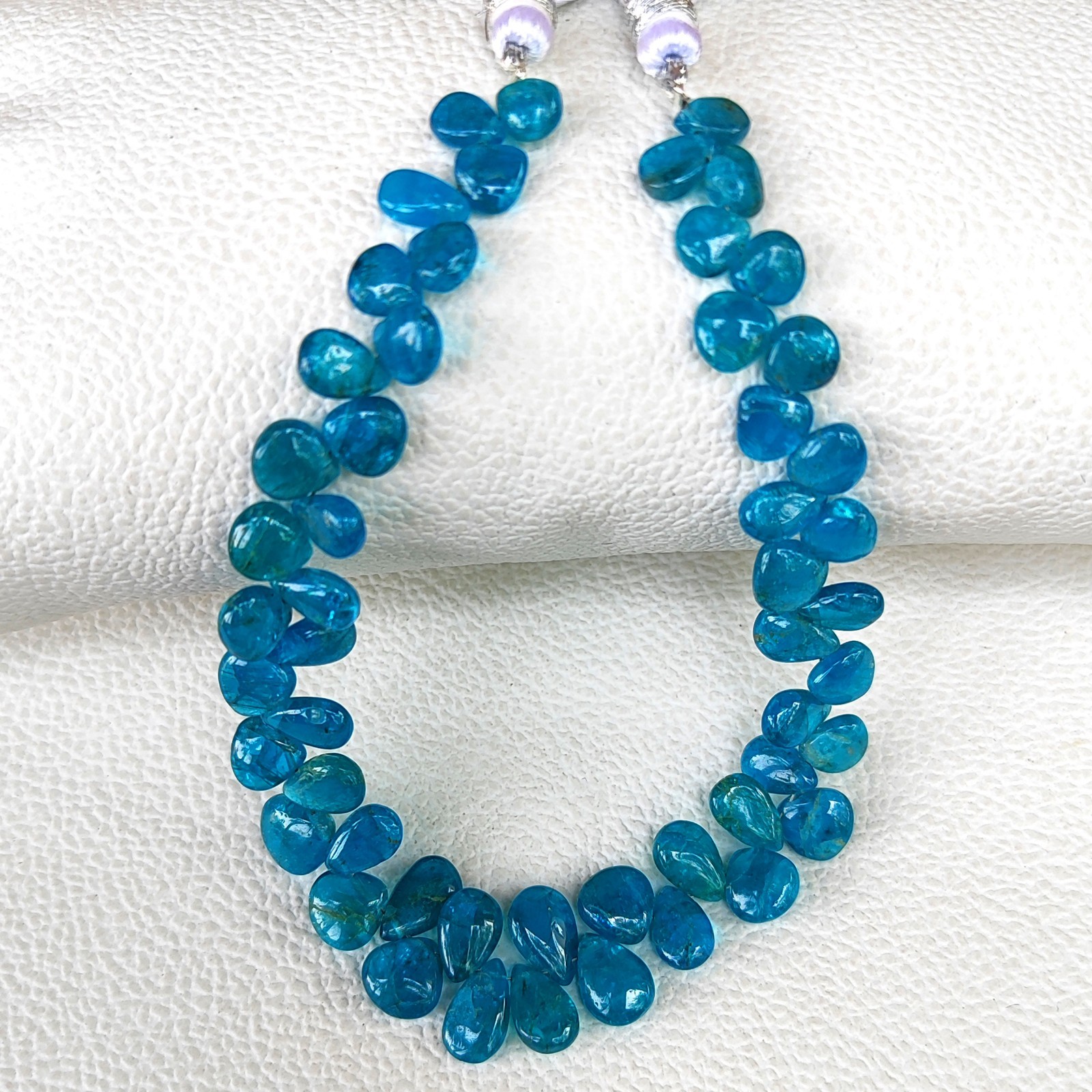 Madagascar Neon Blue Apatite Smooth Pear Shape Beads 6×4 to 8x6mm 7.5″ Strand