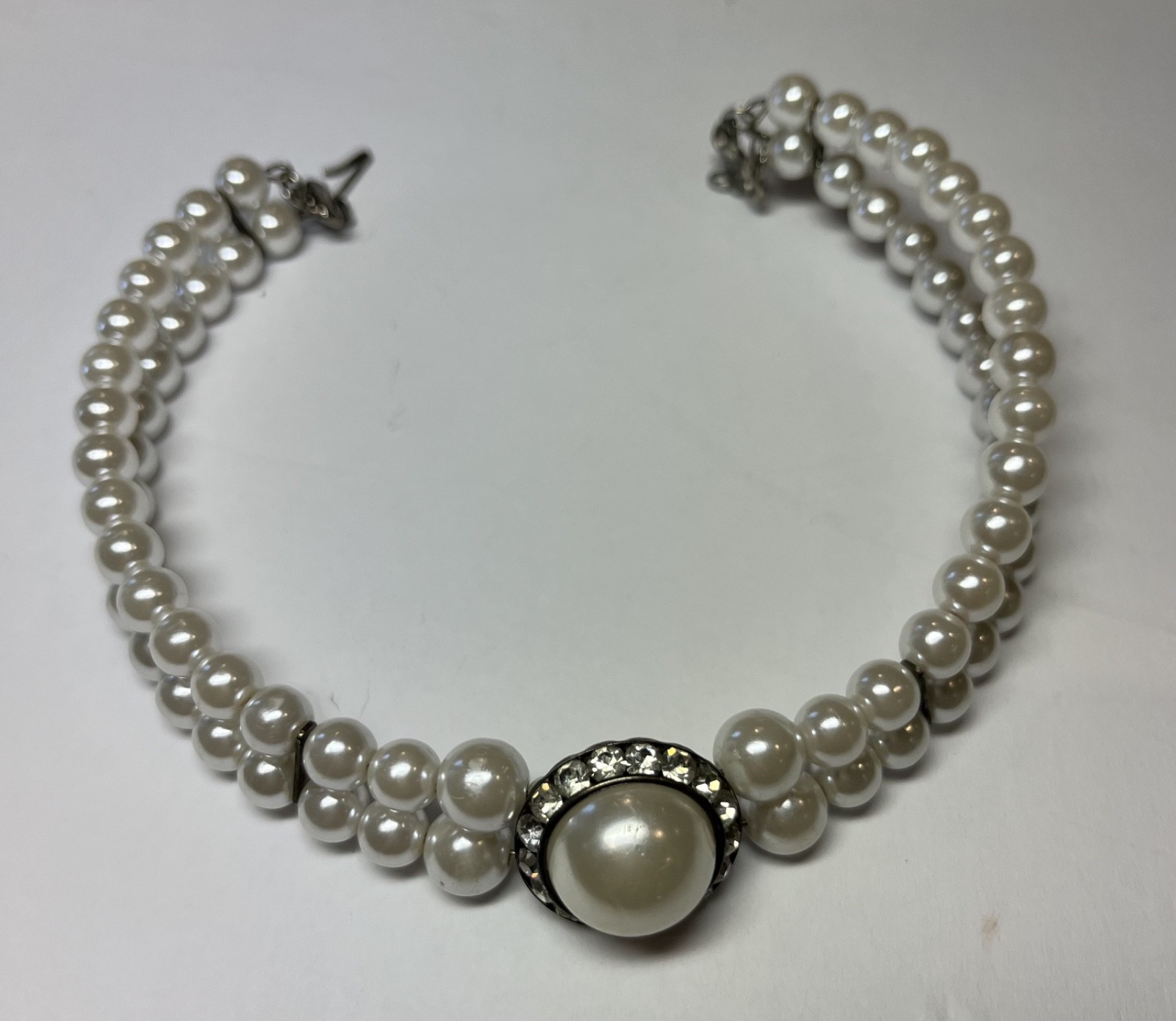 Vintage double strand faux pearl necklace with rhinestone and pearl center