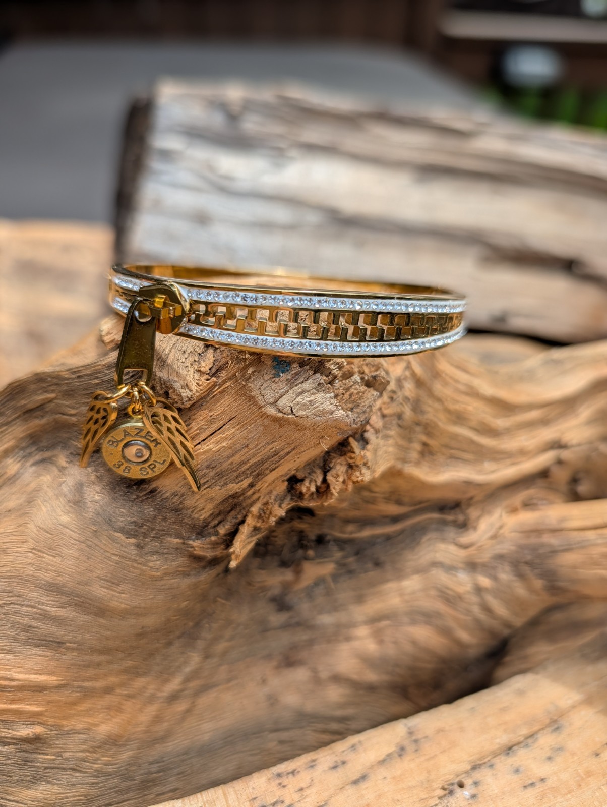 Silver or Gold Stainless Zipper wing and Bullet Bracelet. Optional Glass Crystal