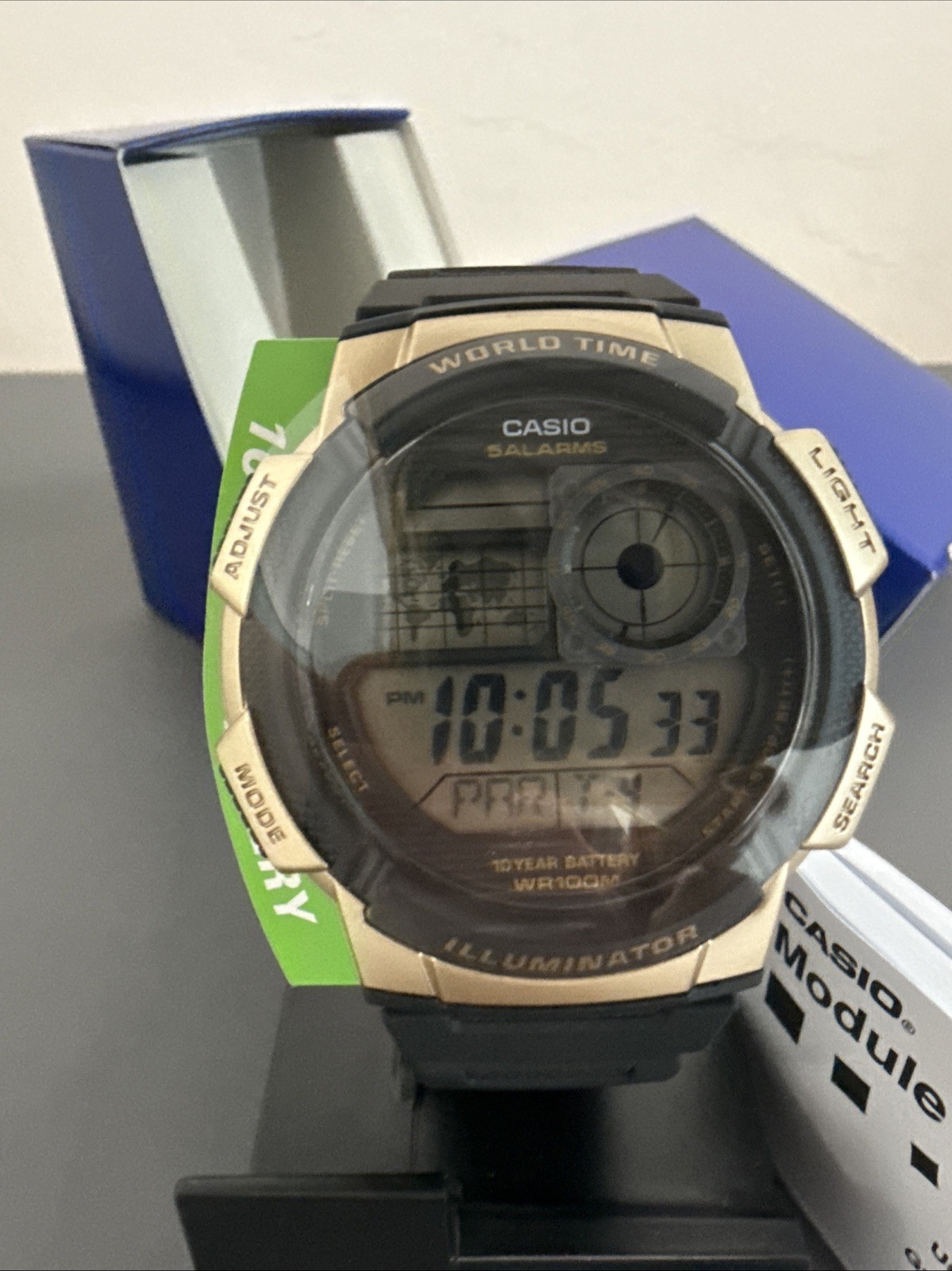 Casio AE1000W-1A3V Men’s Digital World Time Sport Watch Black Gold New