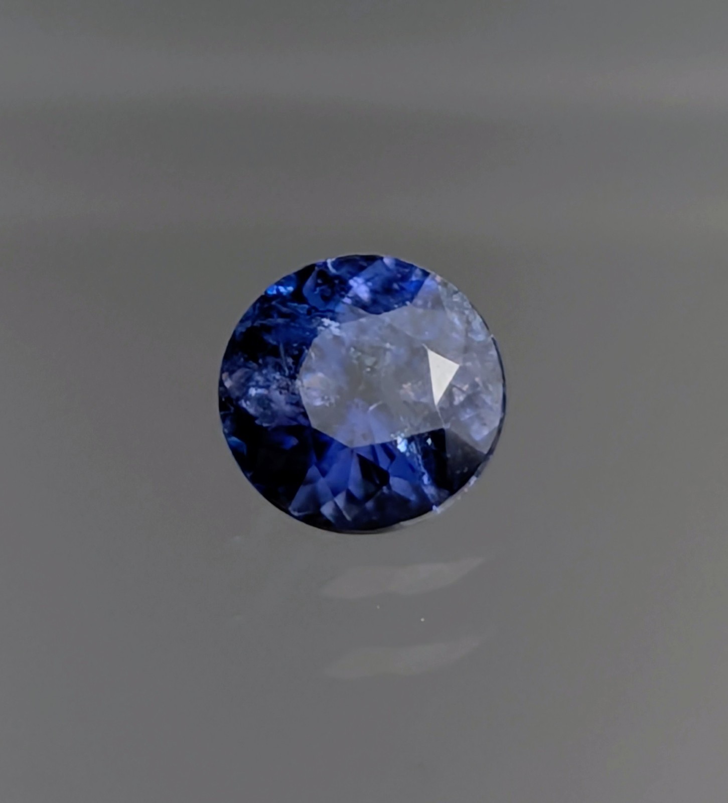 Benitoite: I, round gemstone 0.24 ct