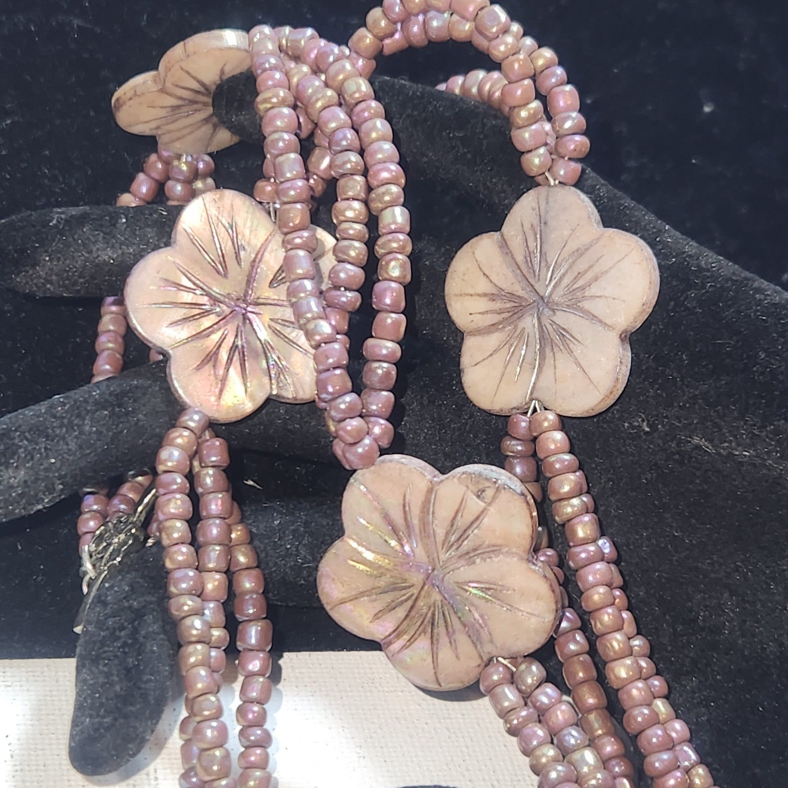 Iridescent Mauve Multi Strand Seed Bead Necklace Carved Shell Flower Toggle 21in