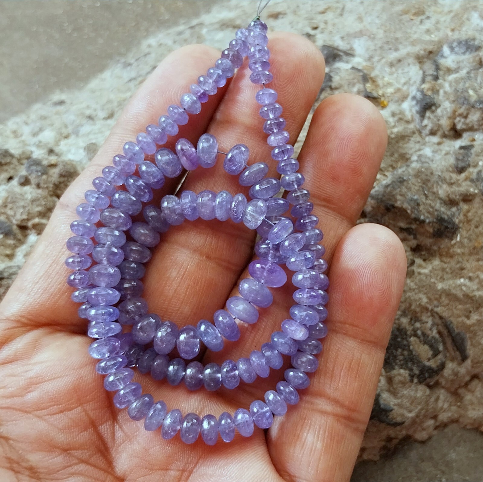 141 Carat 4.5 to 8 MM Natural Light Blue Color Smooth Tanzanite 17 Inch Beads