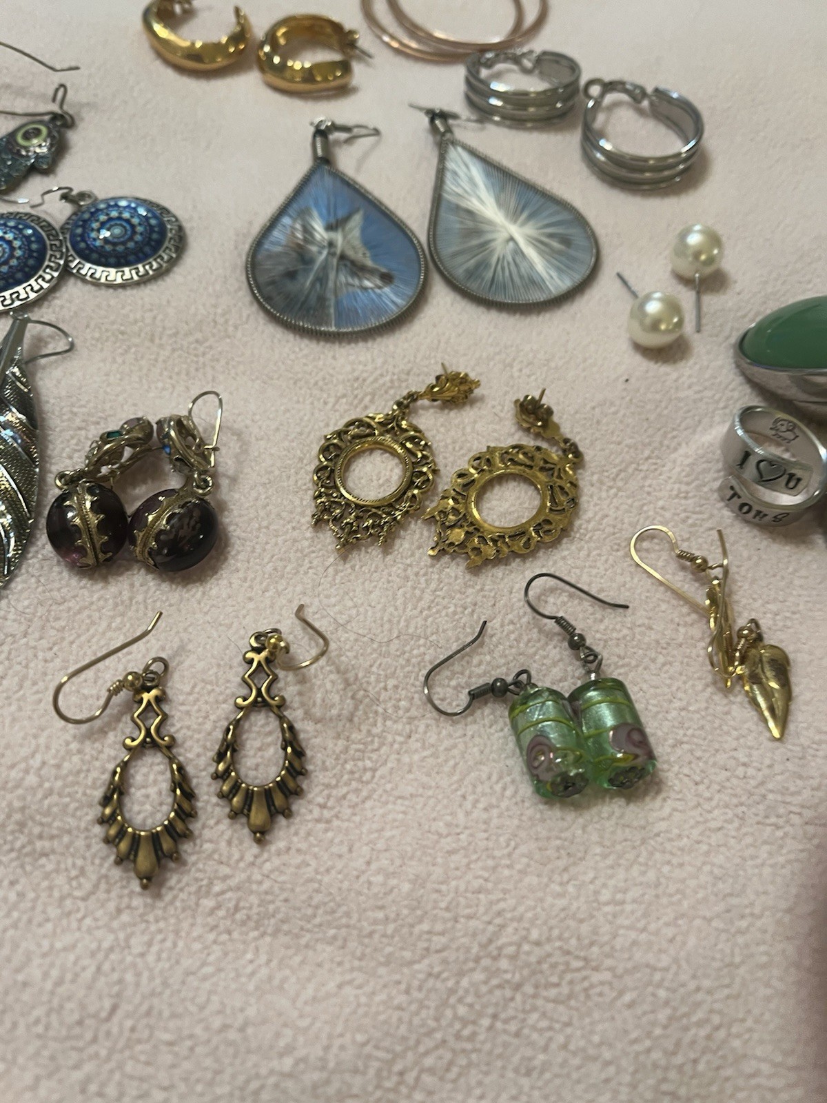 Mixed Lot Of 13 Pairs Of Earrings. 4 rings. Preowned