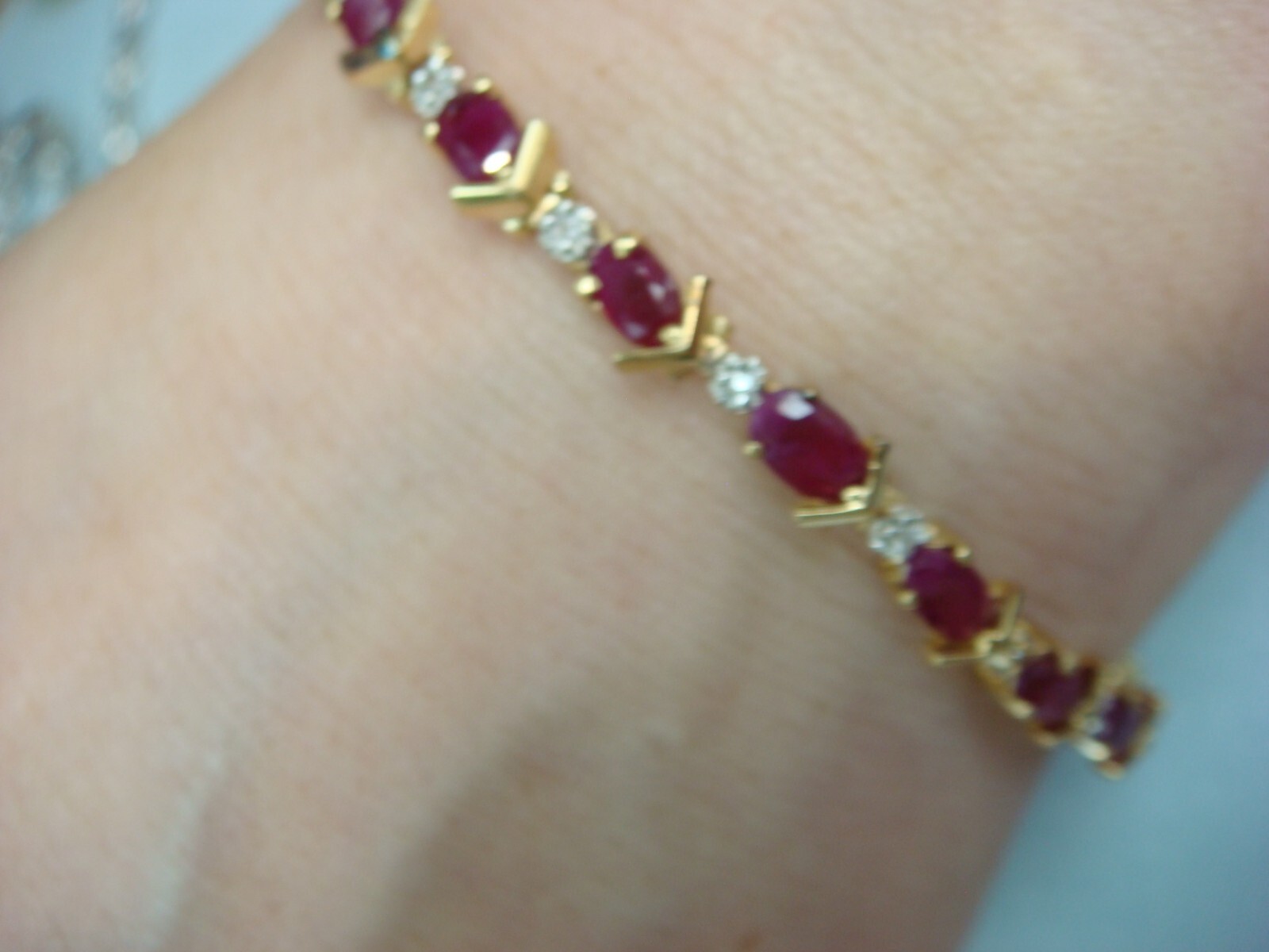 14 KT YELLOW GOLD GENUINE RUBY AND DIAMONDS TENNIS BRACELET 8.8 GRAMS 6.5 “