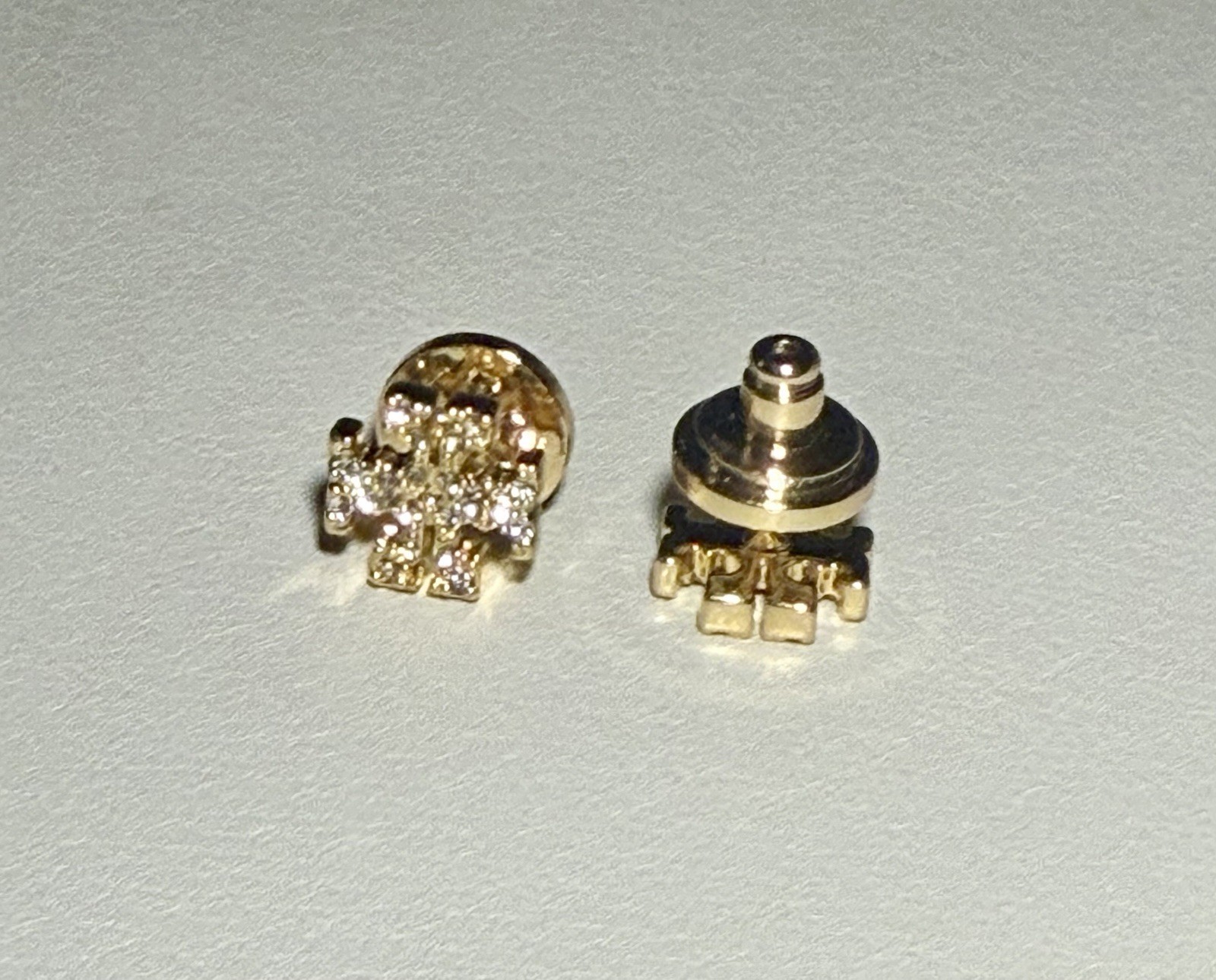 Tory Burch Women’s Gold-Tone Pavé Crystal Logo Stud Earrings.
