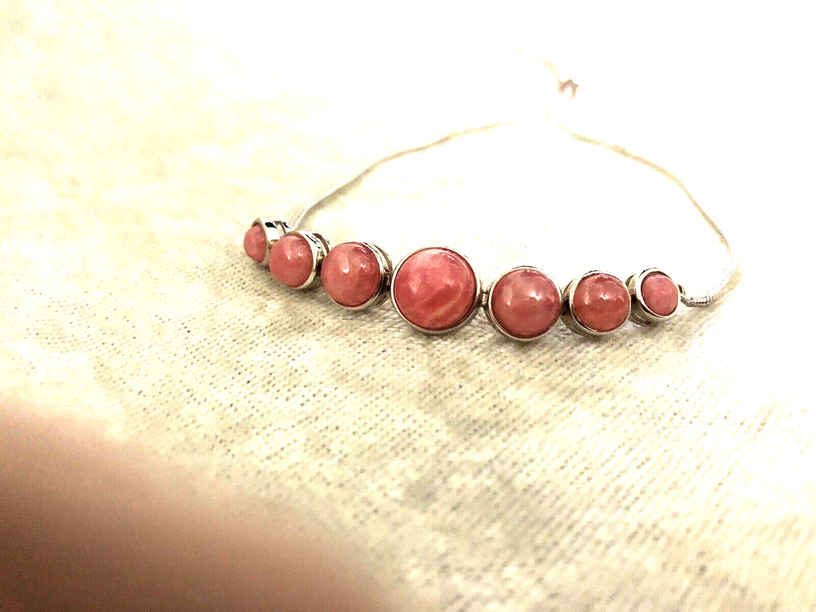 GENERATION GEMS ROUND PINK RHODOCHROSITE GEMSTONE SS ADJ. BRACELET (M4339-24)
