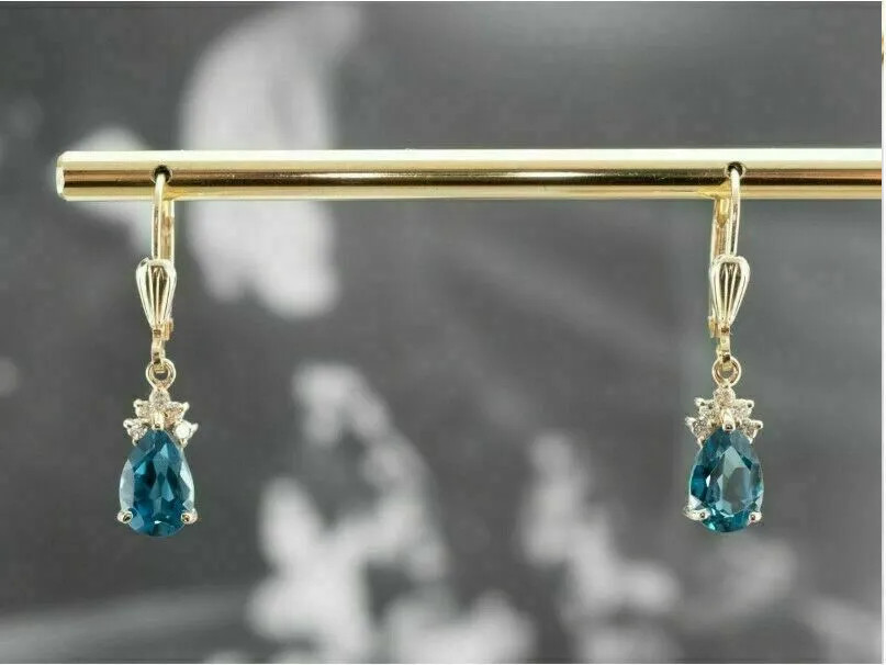 Sterling Silver Blue Teardrop Gemstone Dangle Earrings in Gold Finish