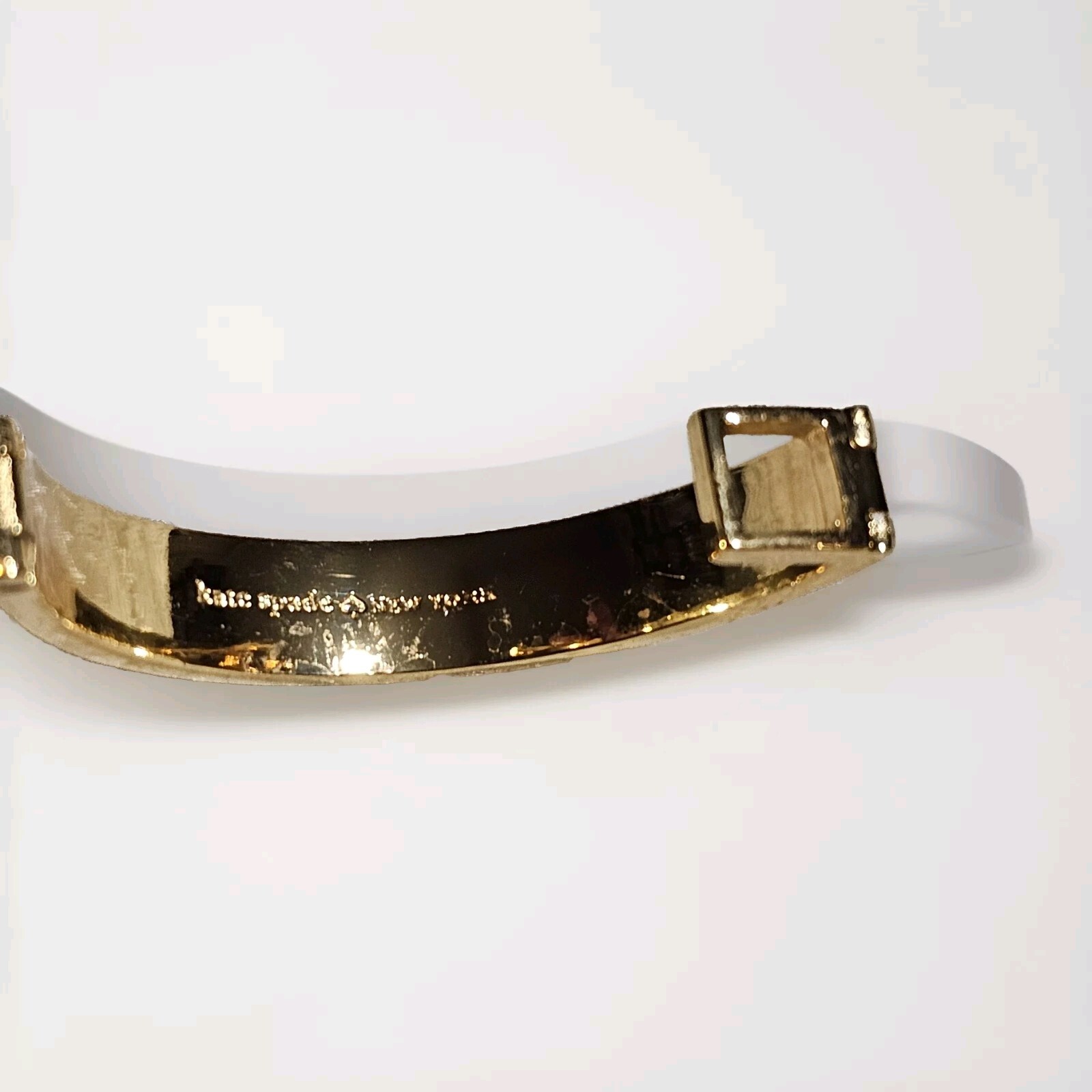 Kate Spade Signed Gold Tone Cream Enamel Turn Lock Hinged Bracelet
