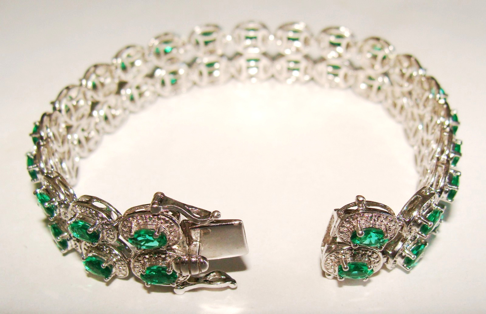 Designer 22.4g Sterling Silver Lab Created Emeralds & 4 Clear Stones Bracelet 7″
