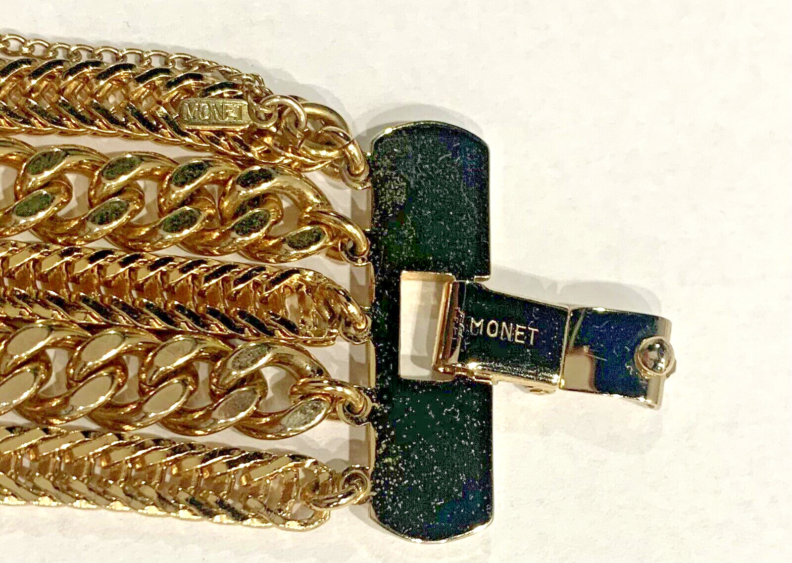 Vintage Signed Monet Gold Tone 5 Strand Chain Bracelet with safety chain