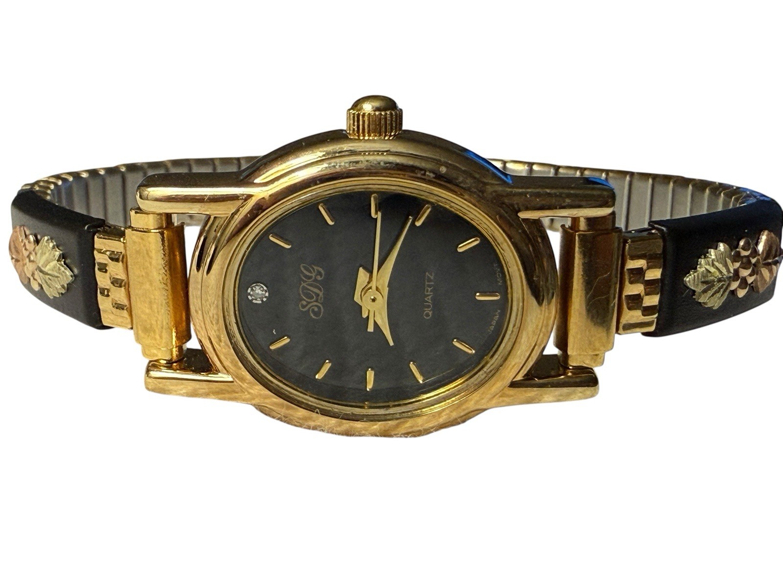 Ladies NOS Retro Vintage Black Hills Gold Stainless Steel Analog Wristwatch