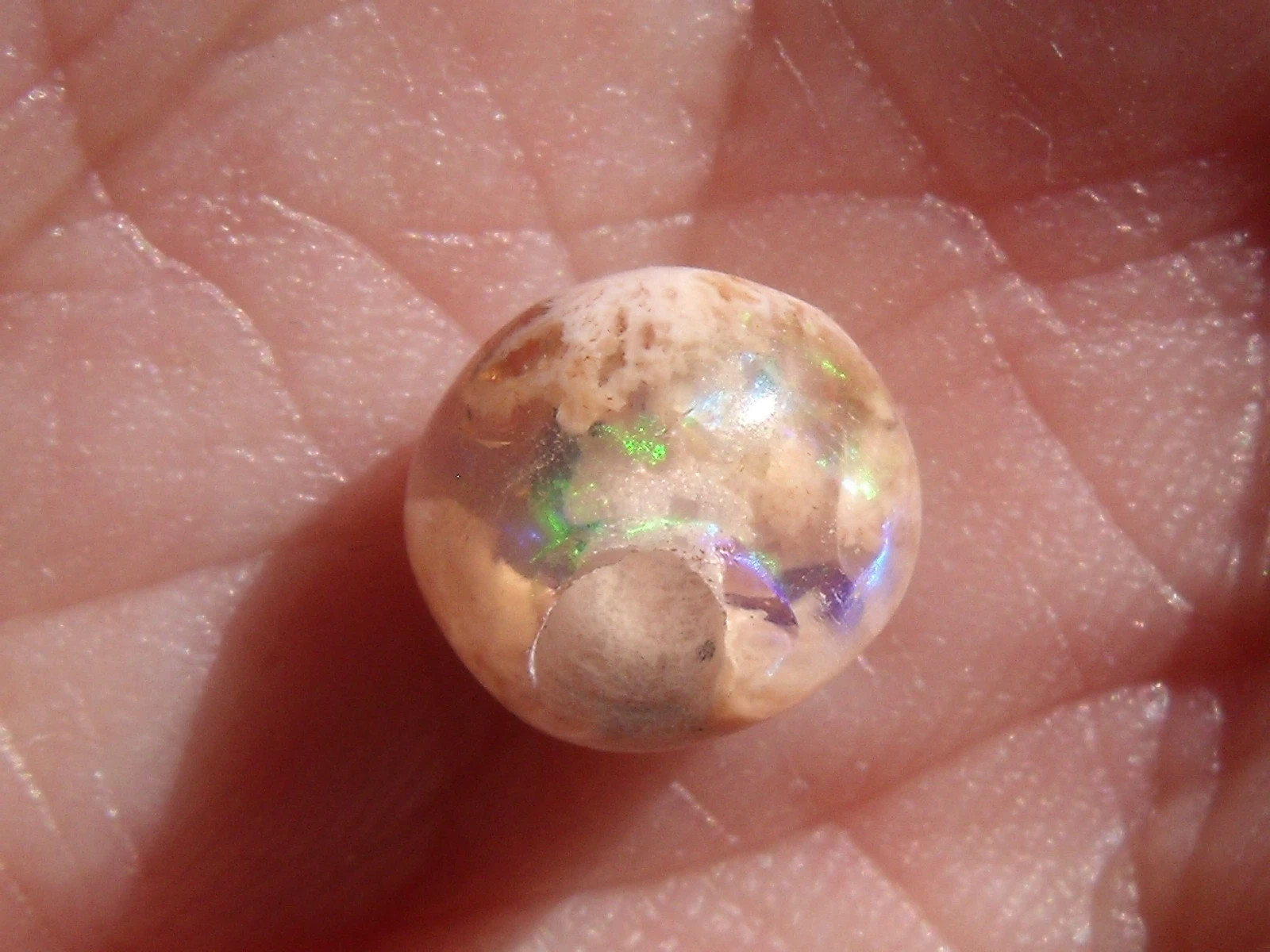 1.91 Ct. Round Cut Mexican Cantera fire opal bead.