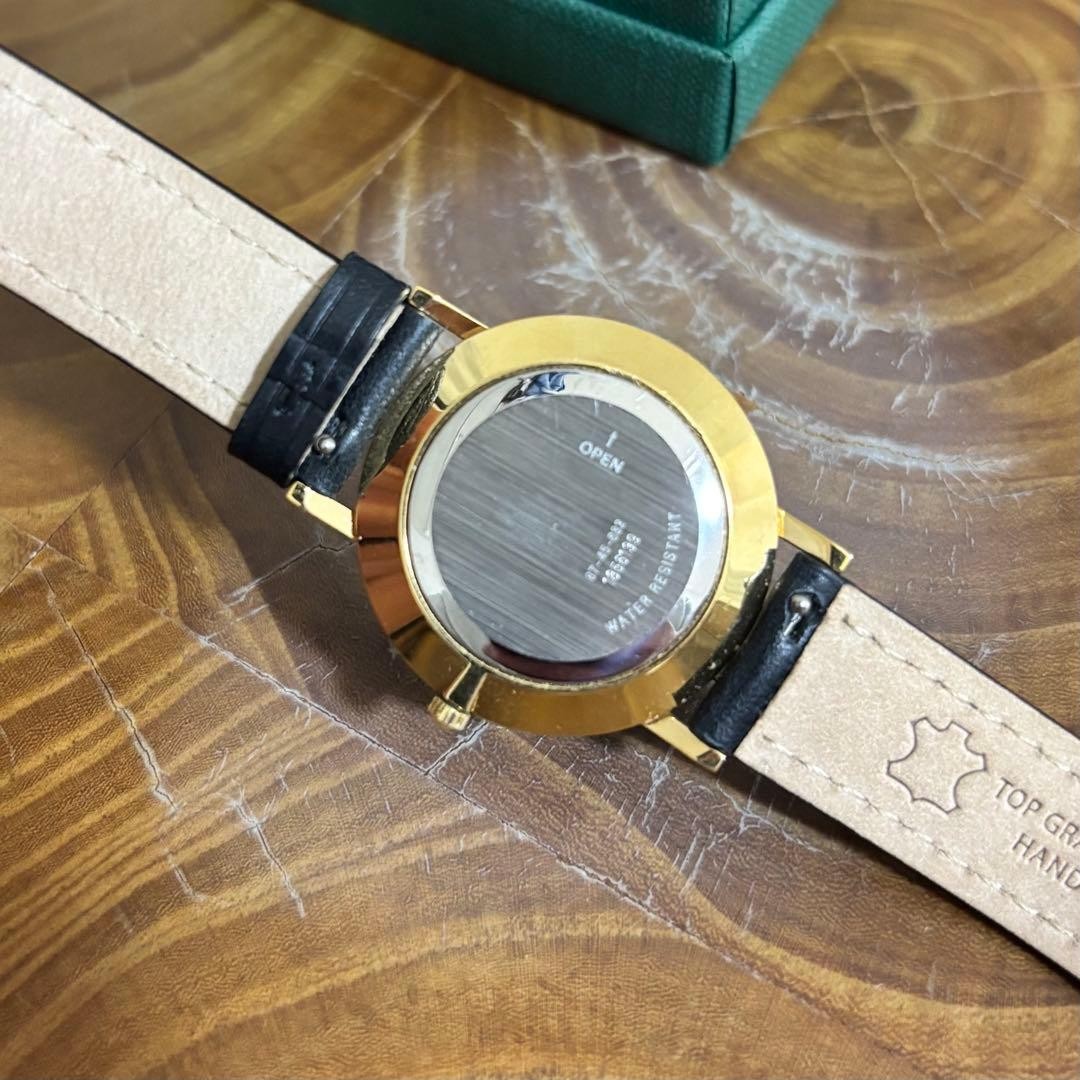 Movado Museum Ultra Slim Black & Gold Minimalist Watch Used