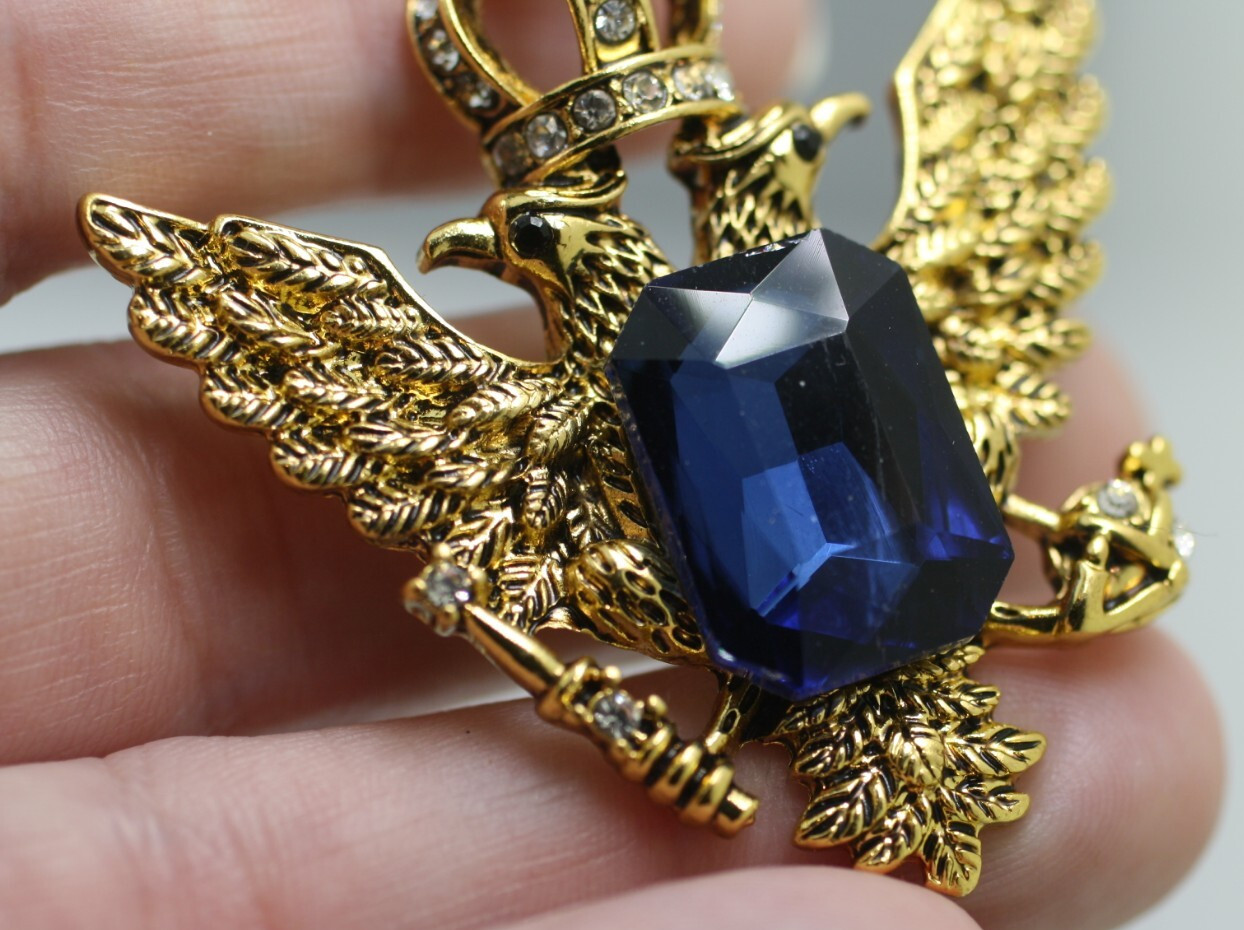 Gold tone double eagle crown blue emerald cut stone pendant regal style