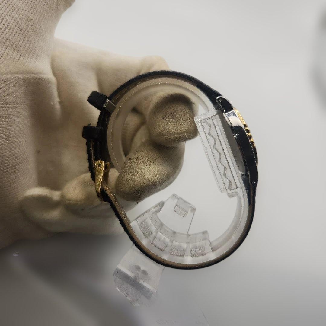 Seiko working ladies’ quartz watch, gold and black oval.