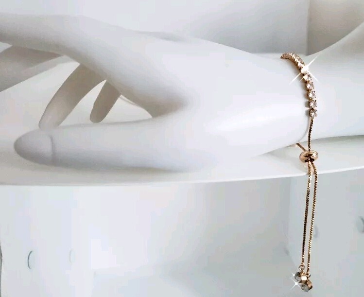 14k Gold Overlay Adjustable Slider Tennis Bracelet Made With Swarovski Crystals