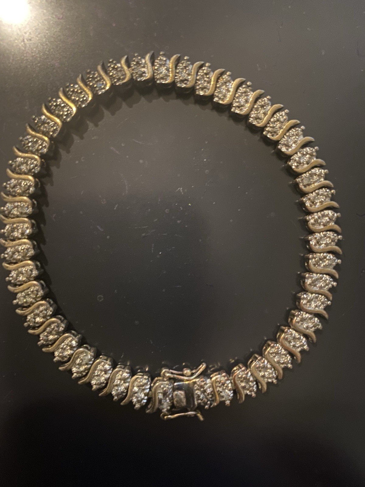 Bracelet, Gold tone RSE 925 Tennis Zirconia , Length 7.5 inches.