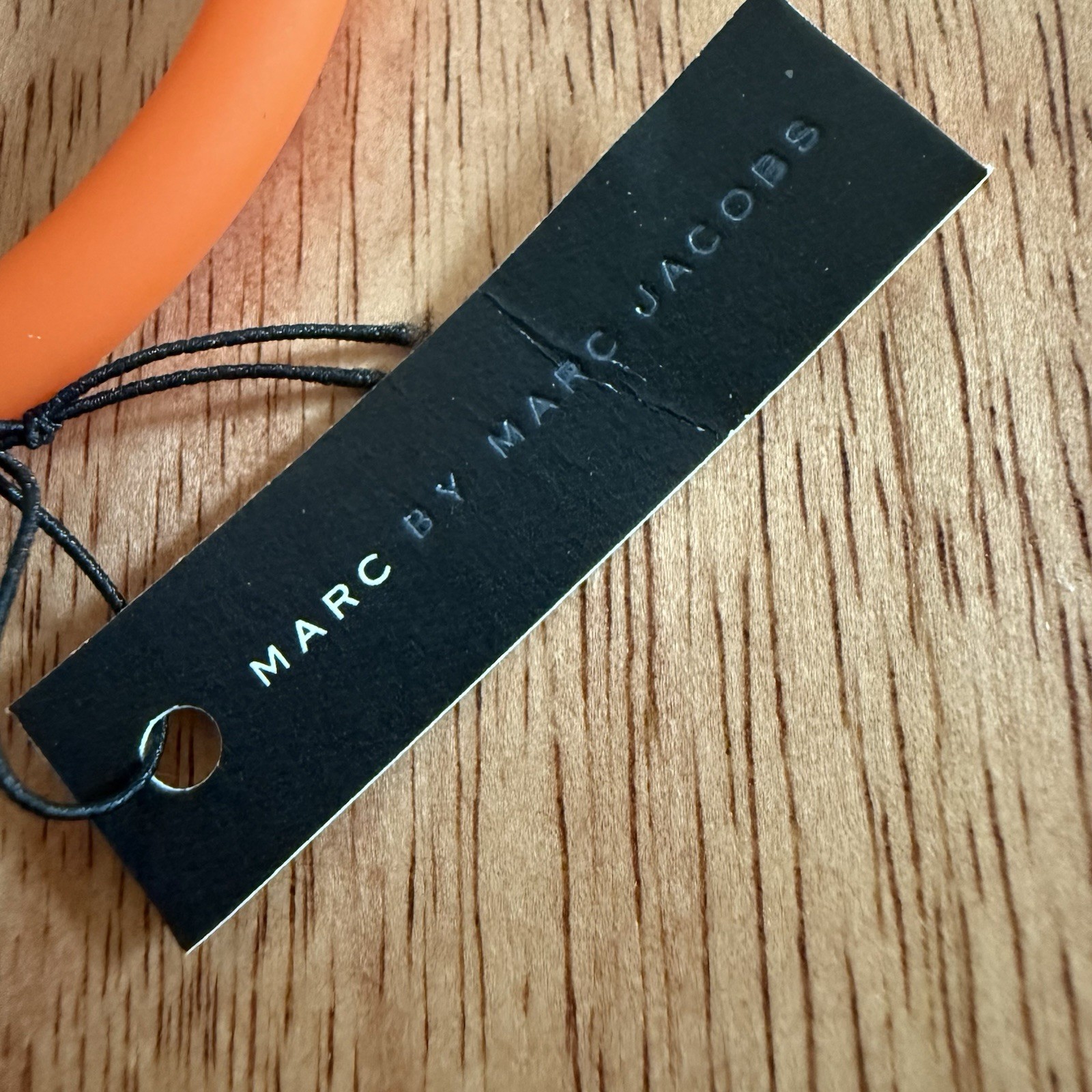 Marc by Marc Jacobs Orange Elastic Silicone Bracelet w/ Gold-Tone Logo Charm NWT