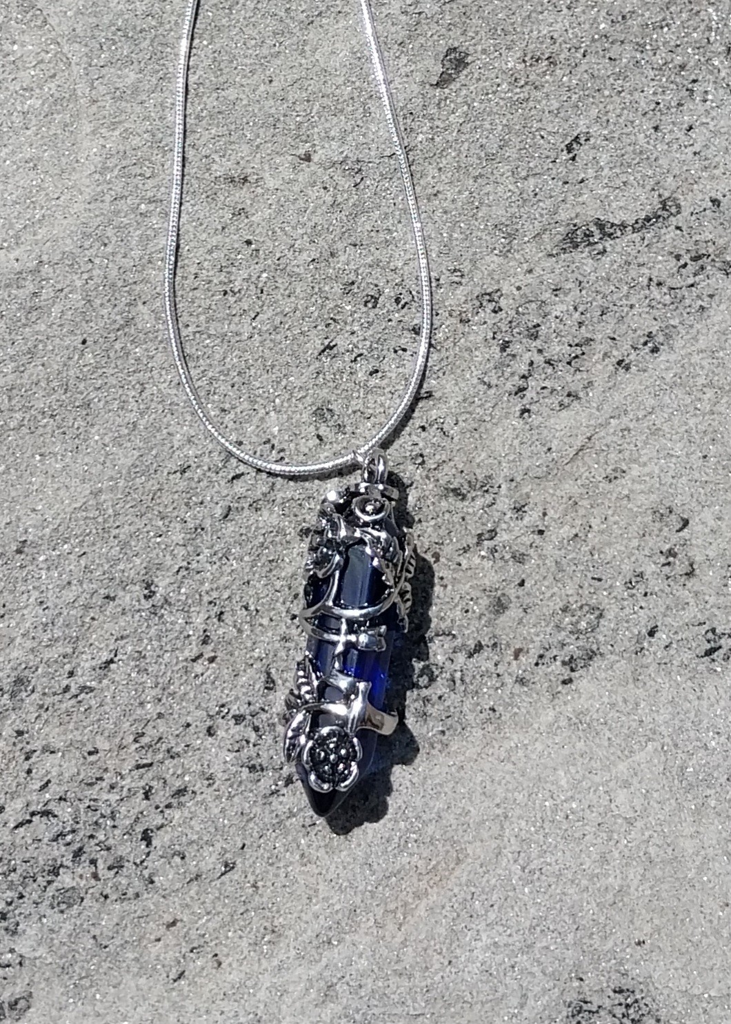 Flower Wrapped Blue Crystal Pendant Necklace