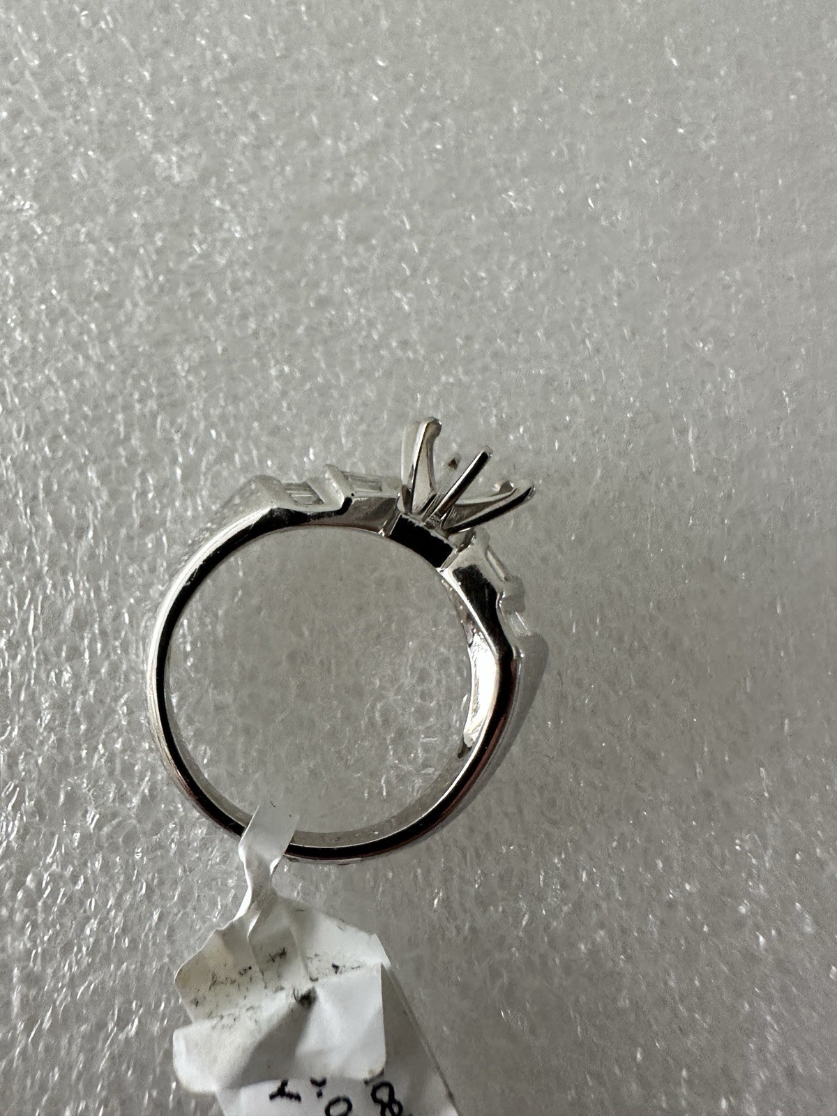 18kt.white gold semi mount ring with baguette diamonds size 7,4.90 gram.