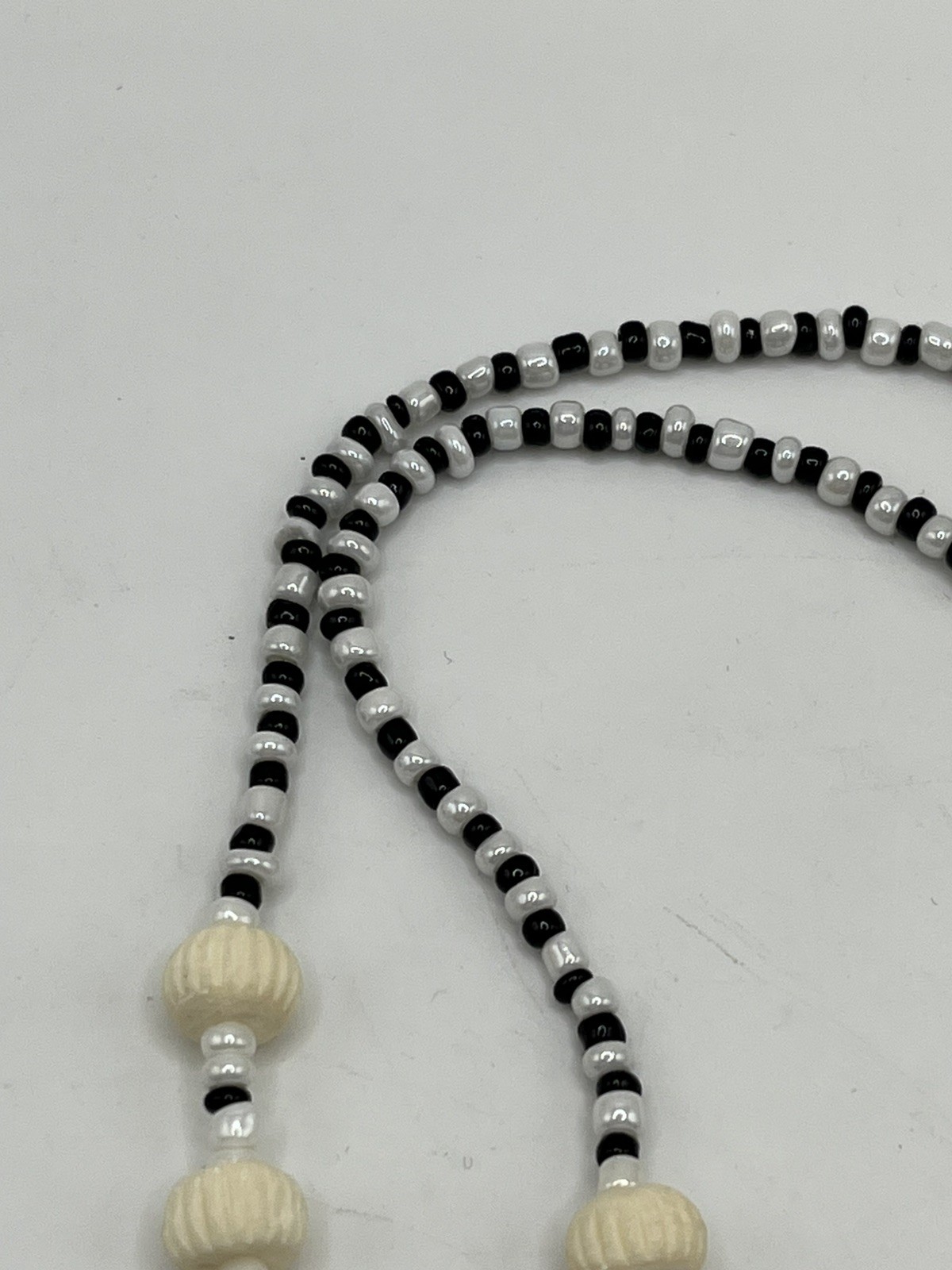 Carved Pendant Black and White Beaded Necklace 20”