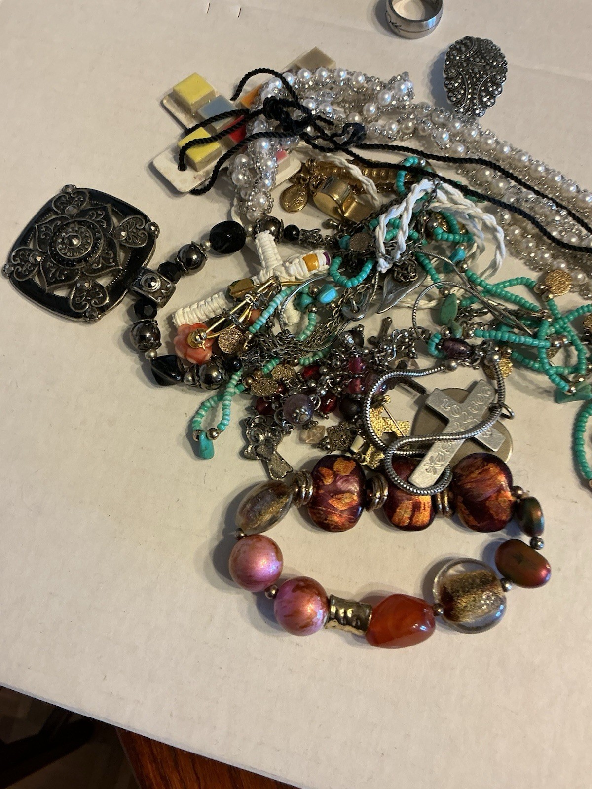 random lot of jewelry ( necklaces bracelets rings etc)