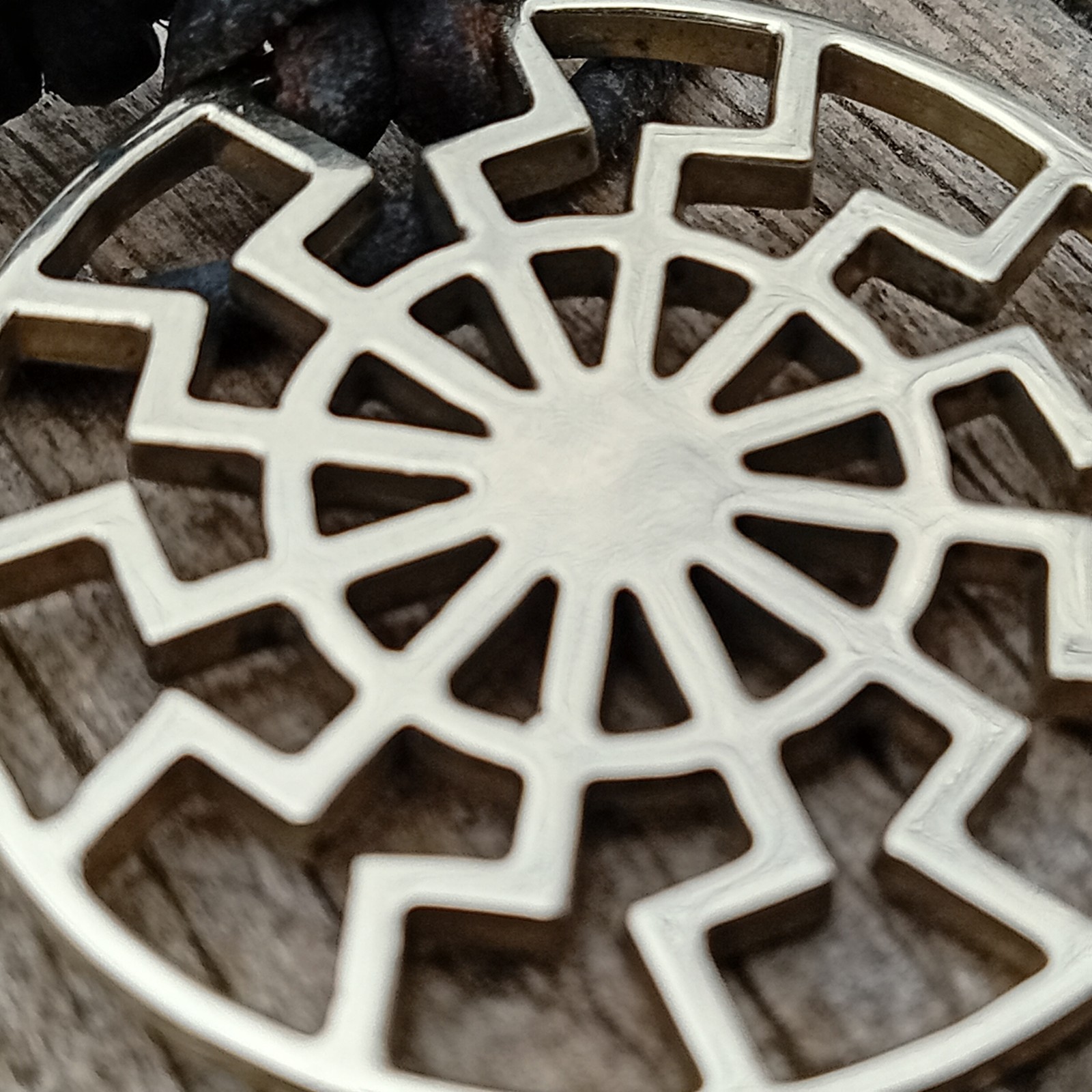 Black Sun Pendant Necklace – Brass Sonnenrad Medallion on Black Cord