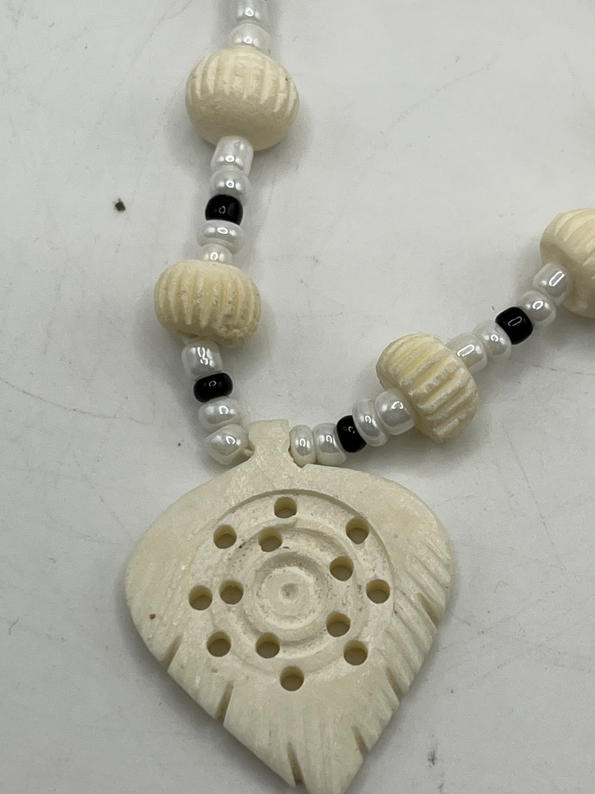 Carved Pendant Black and White Beaded Necklace 20”