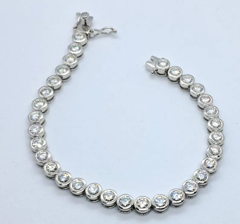 4 mm Round Cut Moissanite Bezel Set Tennis Bracelet In 14K White Gold Plated