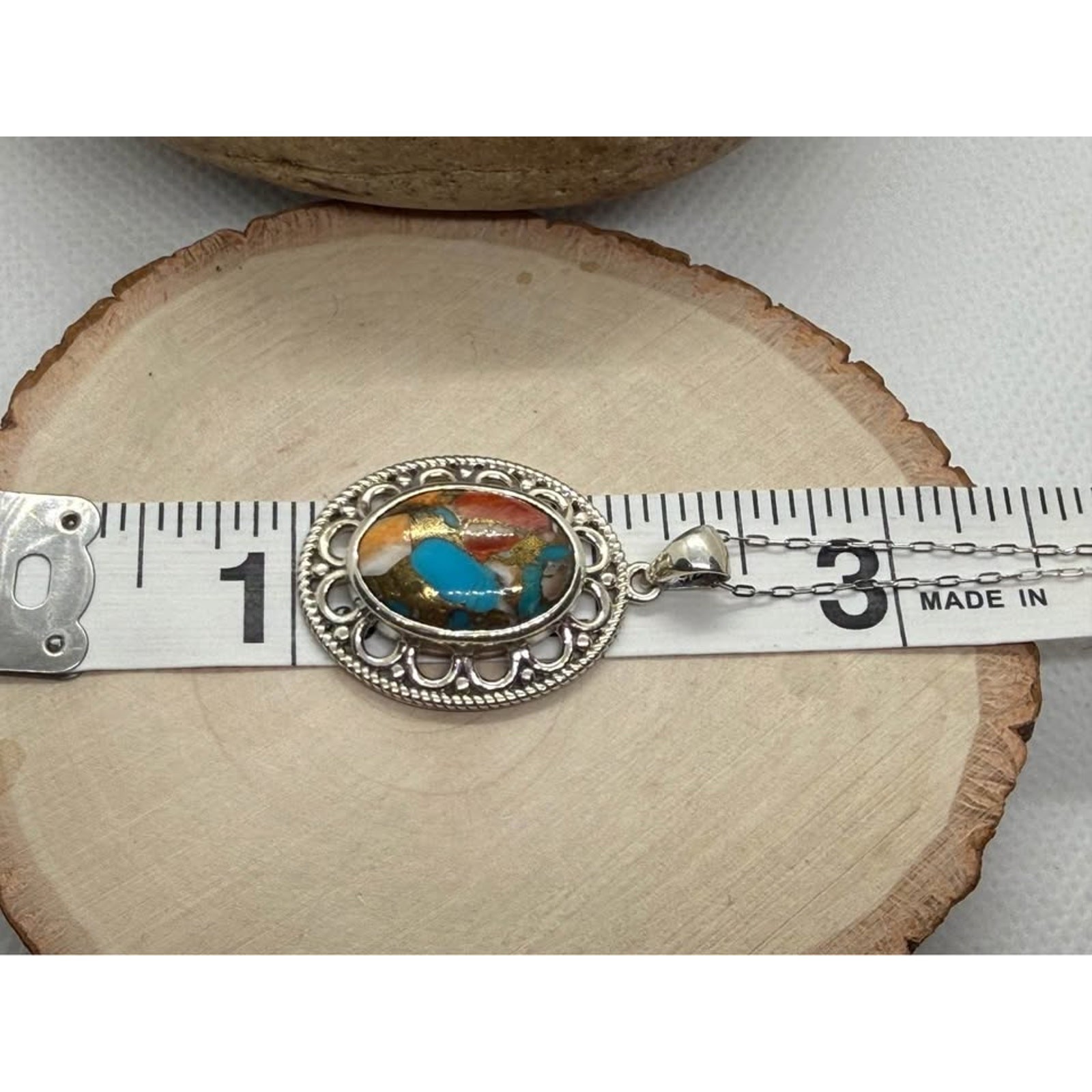 Spiny Oyster Turquoise Pendant – 5.00 Carats