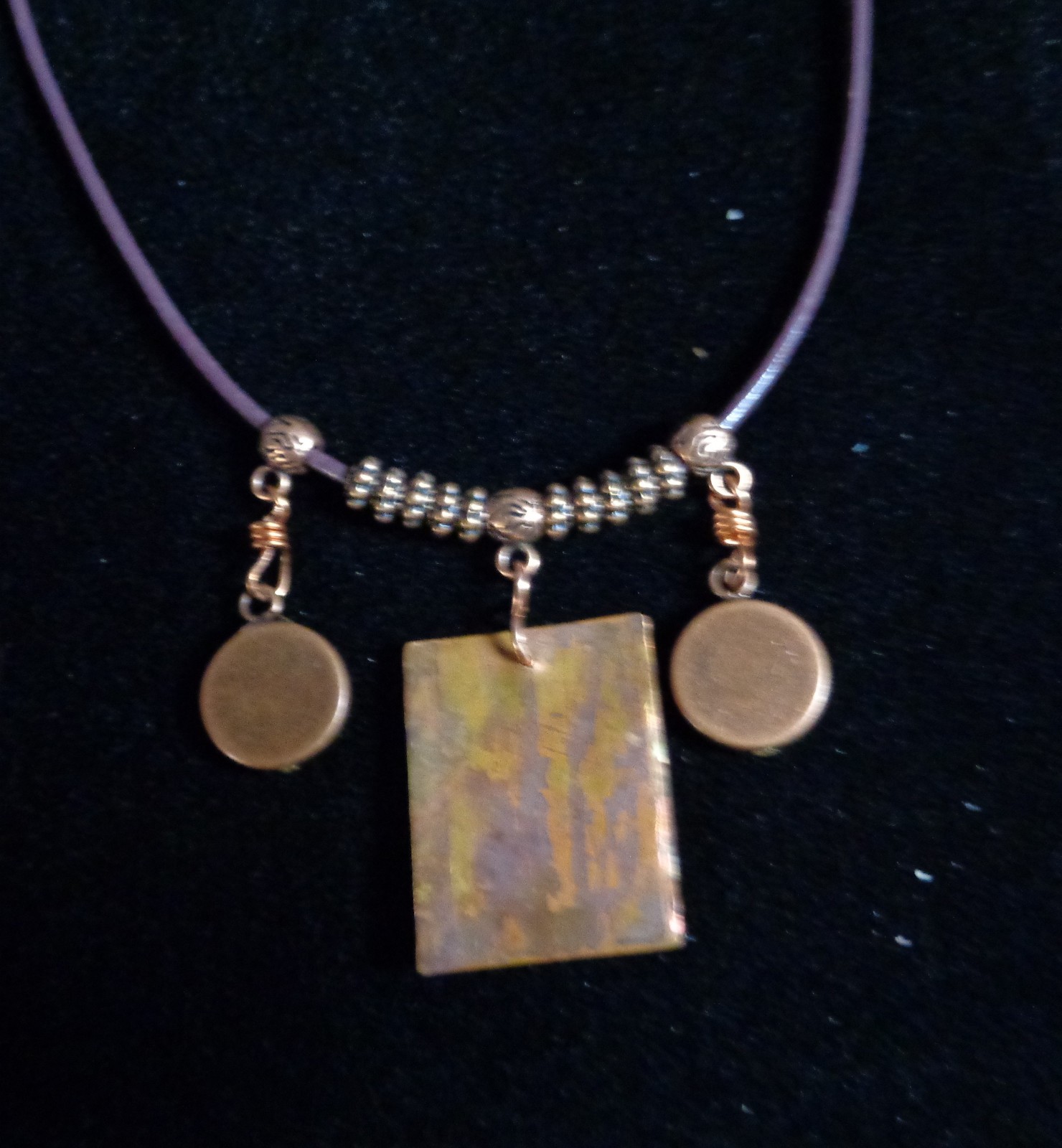 Artisan crafted,eclectic,18” necklace. Central handcrafted copper collage pendan